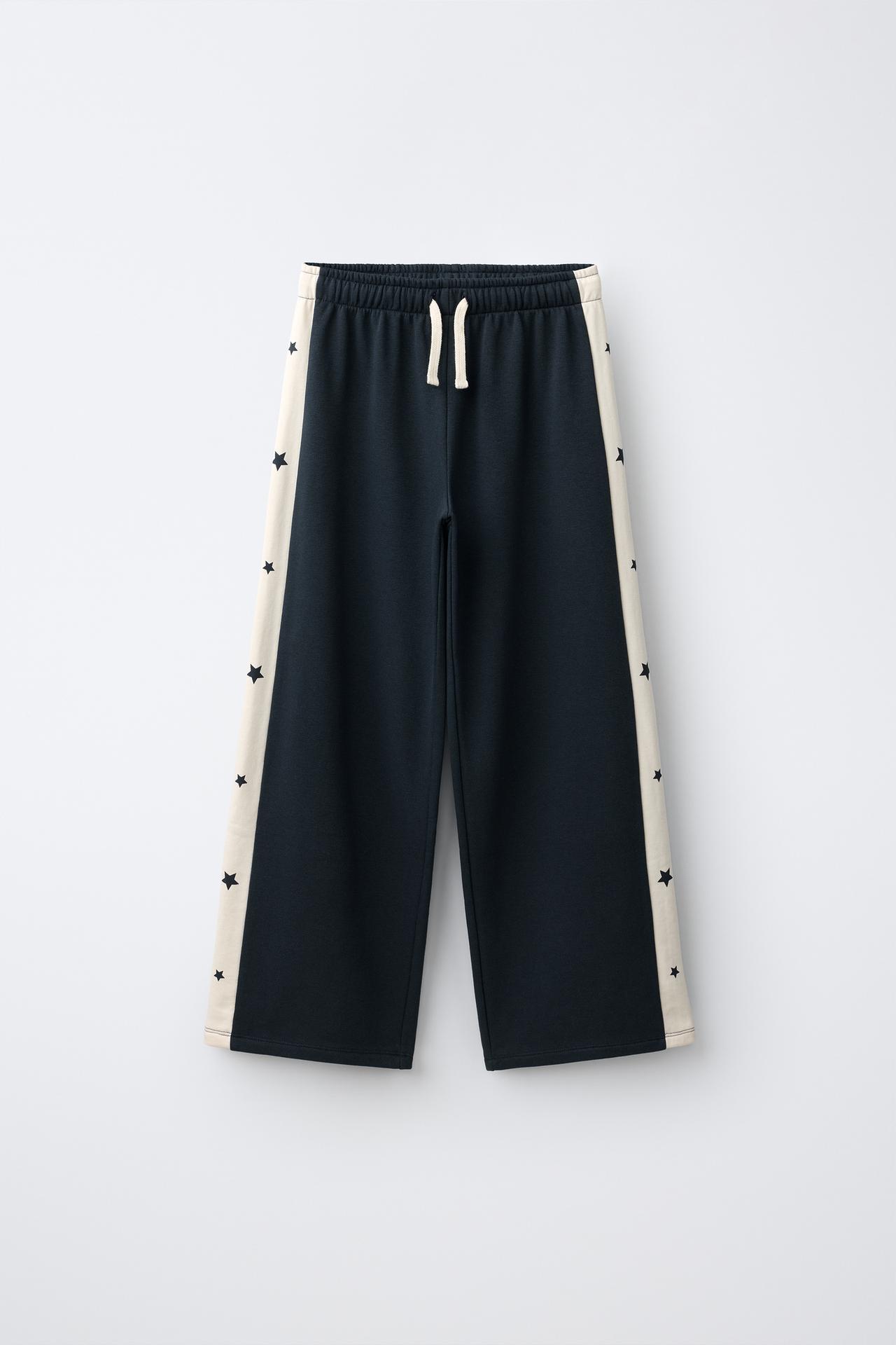 БРЮКИ WIDE LEG С ЛАМПАСАМИ И ЗВЕЗДАМИ