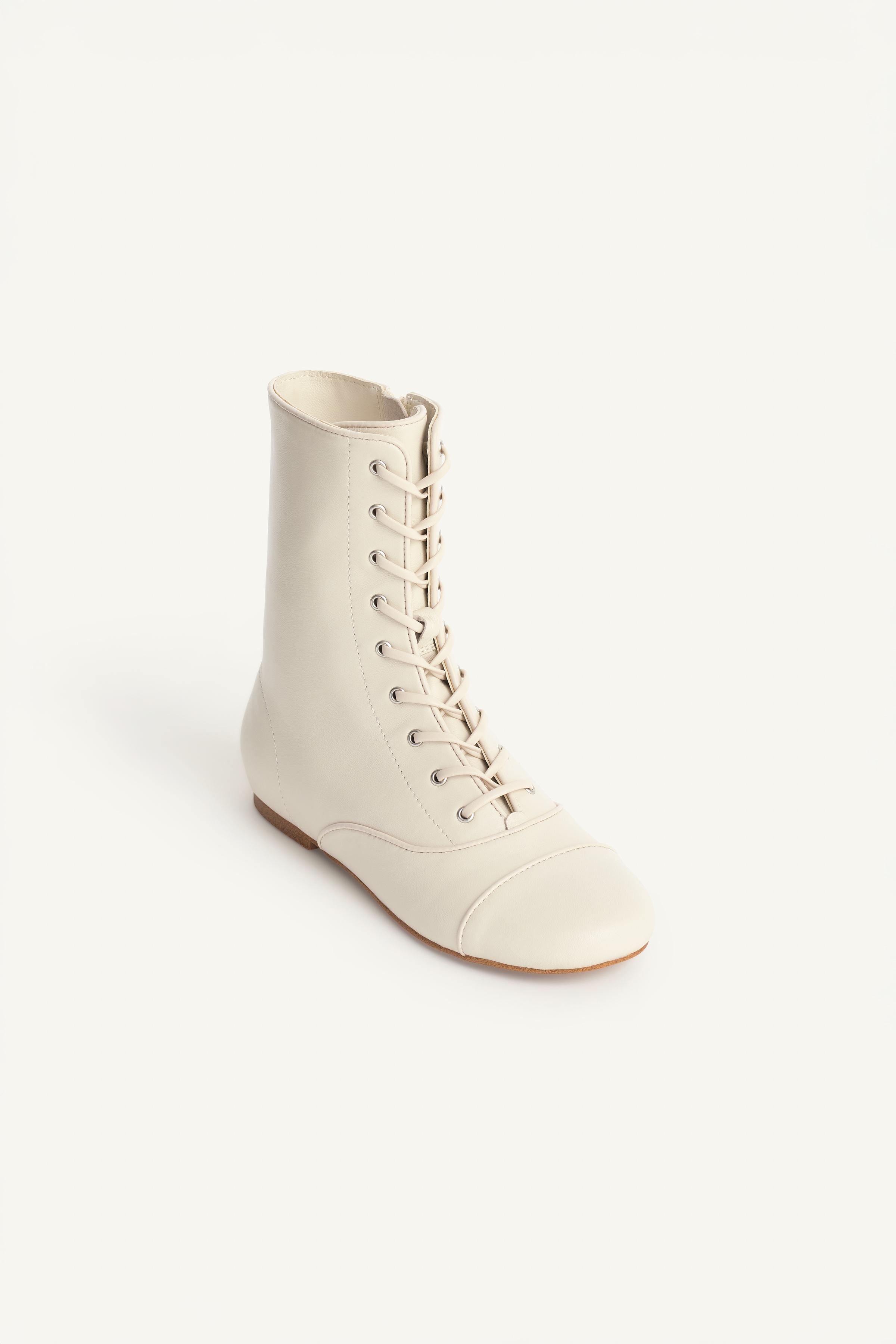 BOTTINES LACÉES EN CUIR LIMITED EDITION