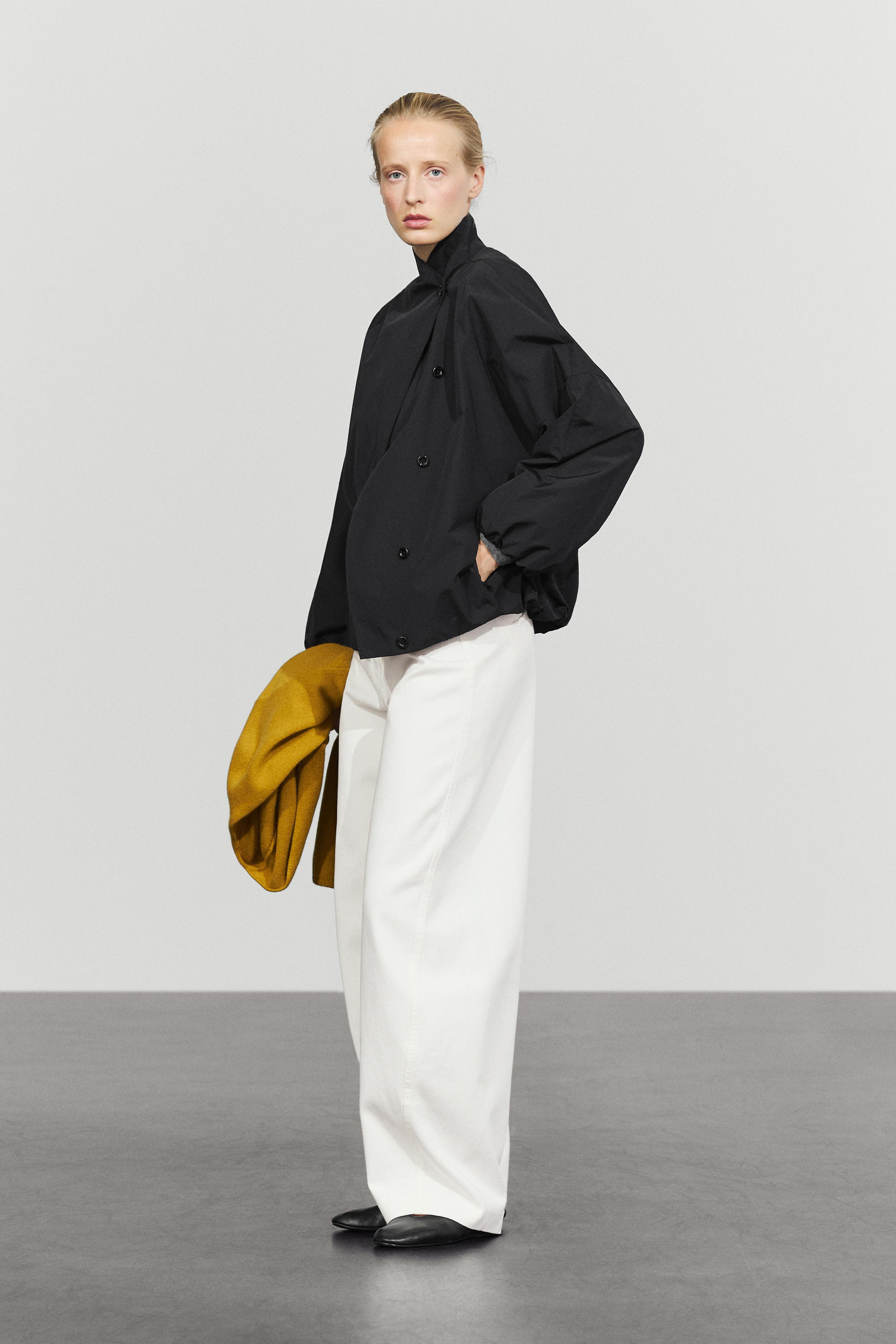 Technical bomber jacket with side button
