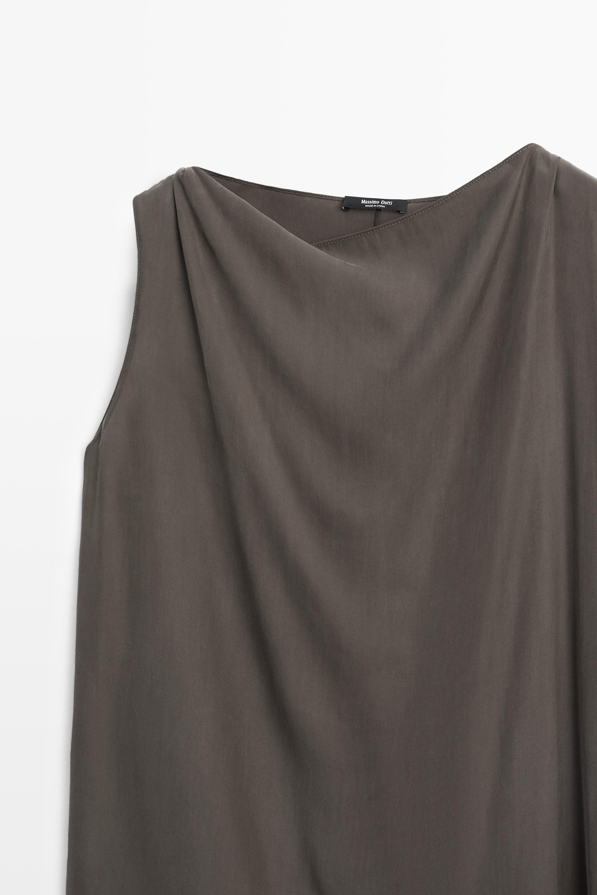 Asymmetric flowing cape top — Black gold
