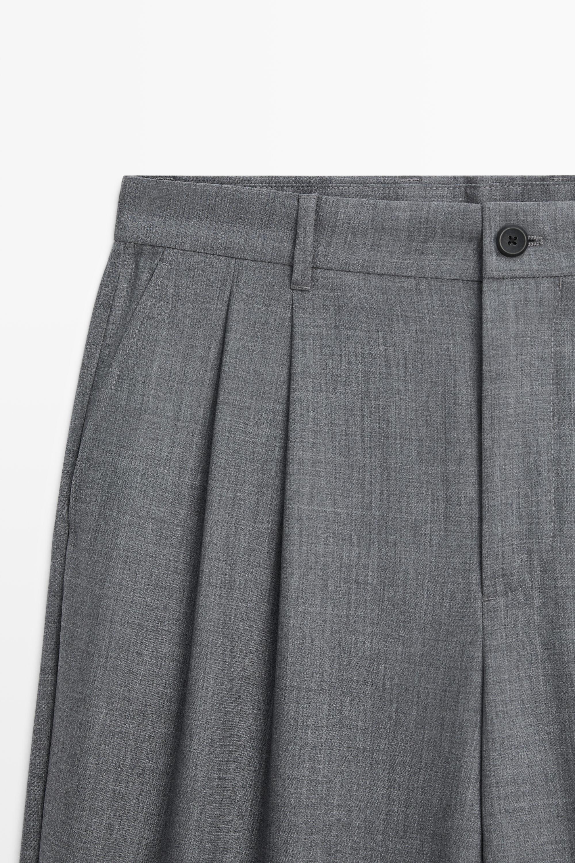 Pantalon relaxed fit à pinces en laine froide