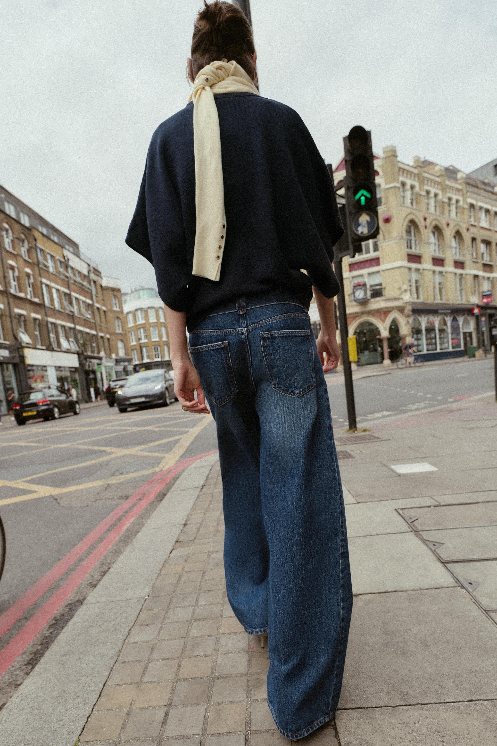 MID-RISE BELTED WIDE LEG JEANS