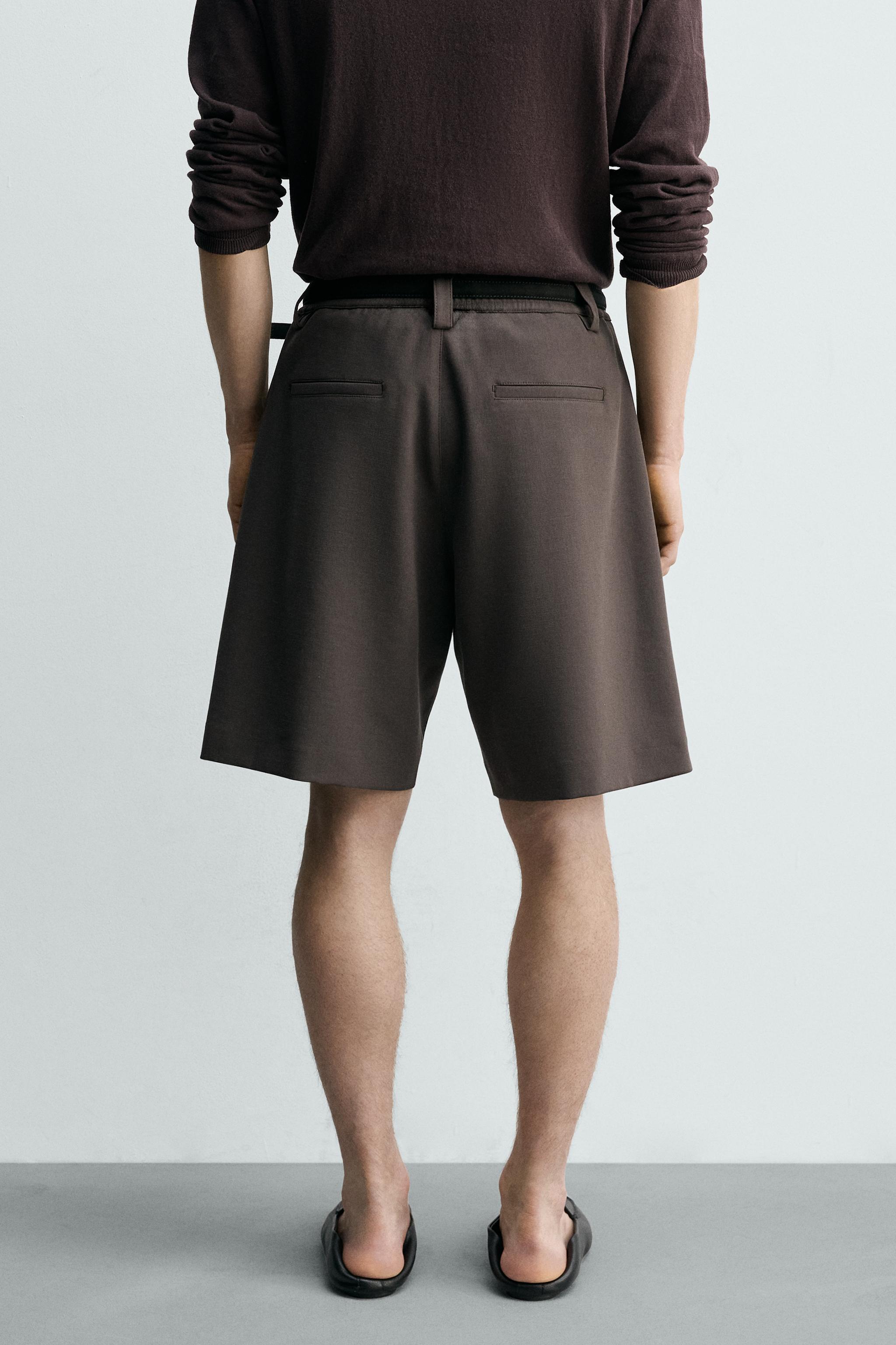 BERMUDA RELAXED FIT PLIS LATÉRAUX