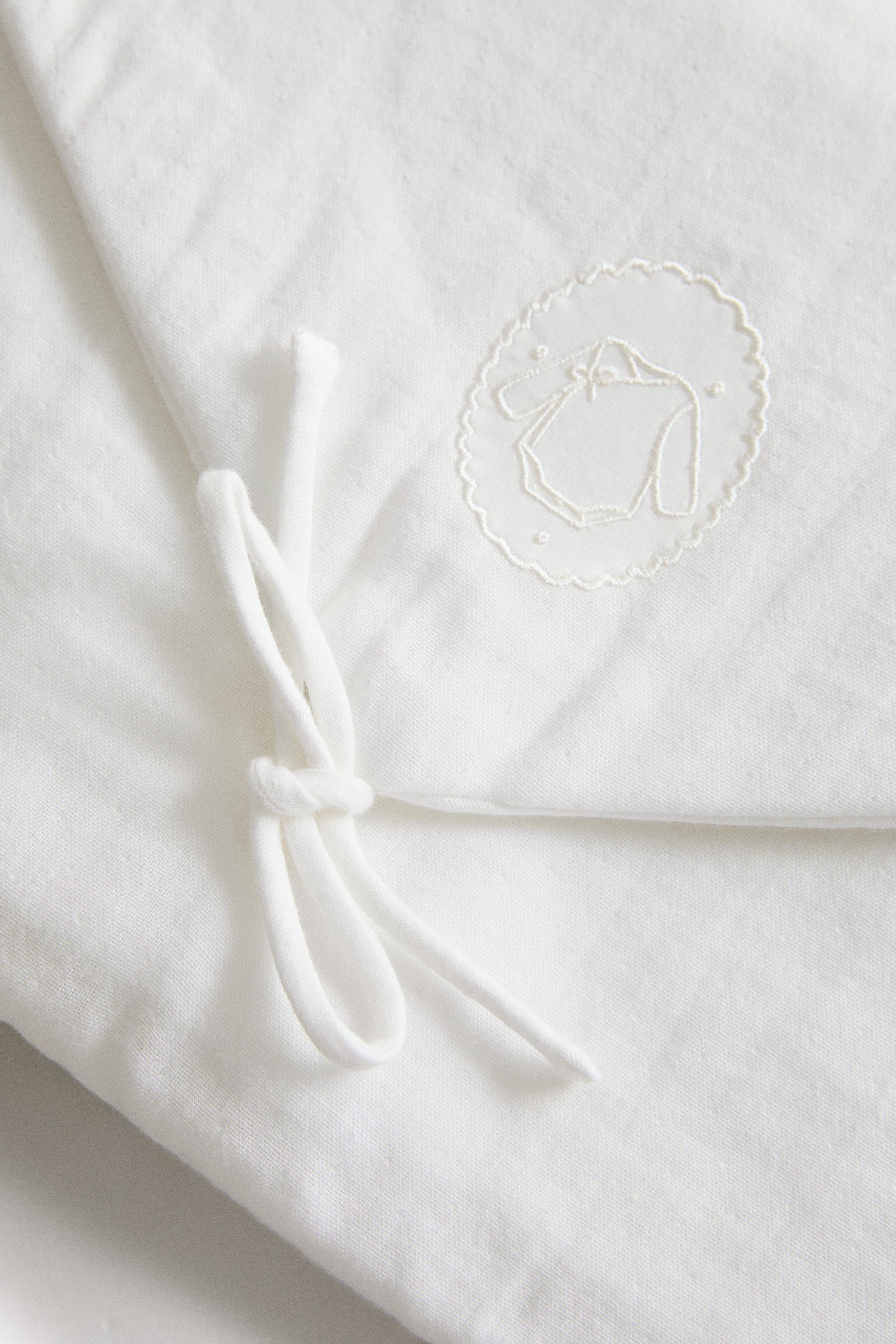 EMBROIDERED KIDS’ CLOTHING BAG — Oyster-white