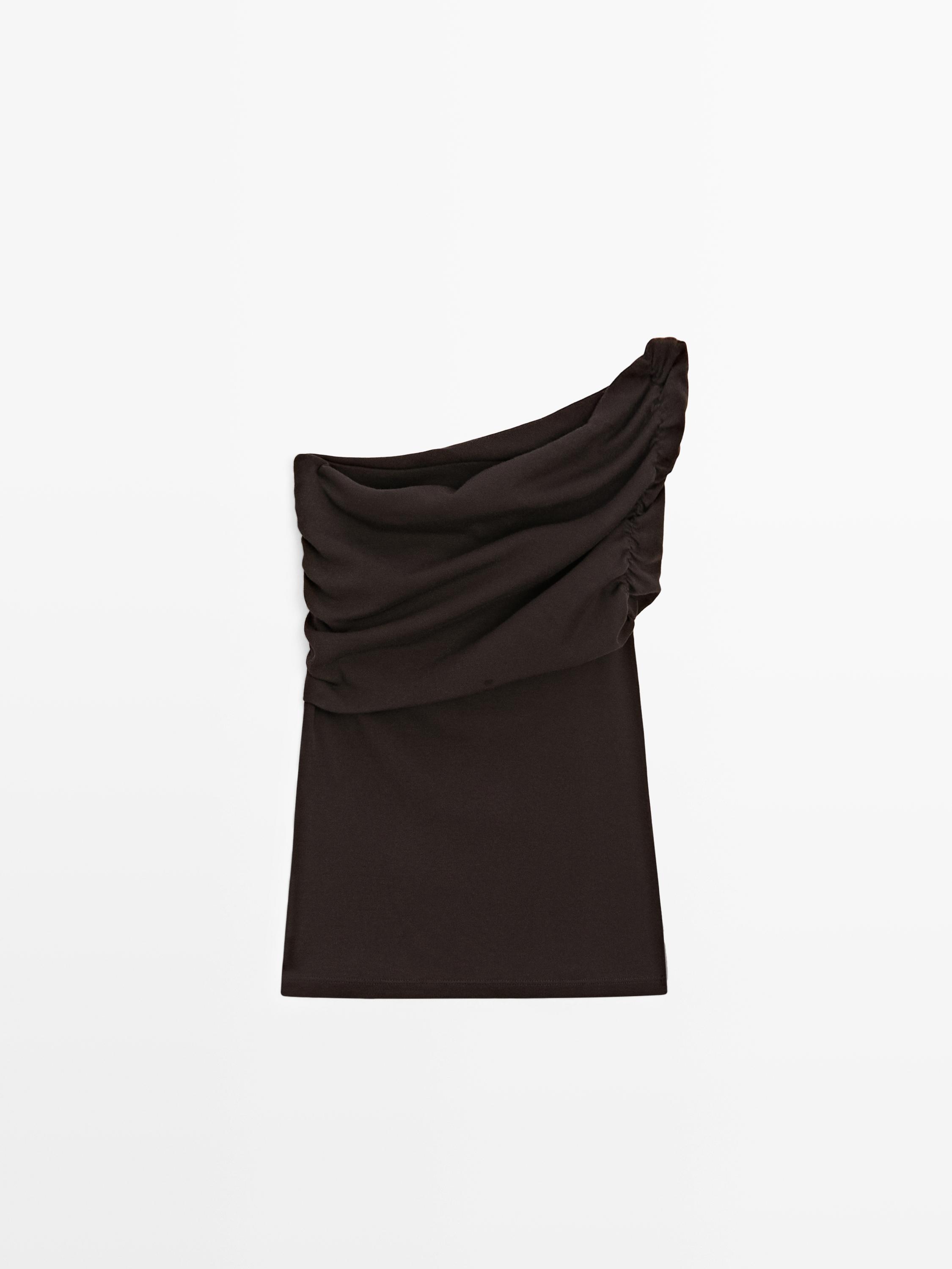 Top asymétrique à encolure drapée