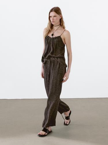 Pantalón fluido ancho jacquard - Negro oro de Zara