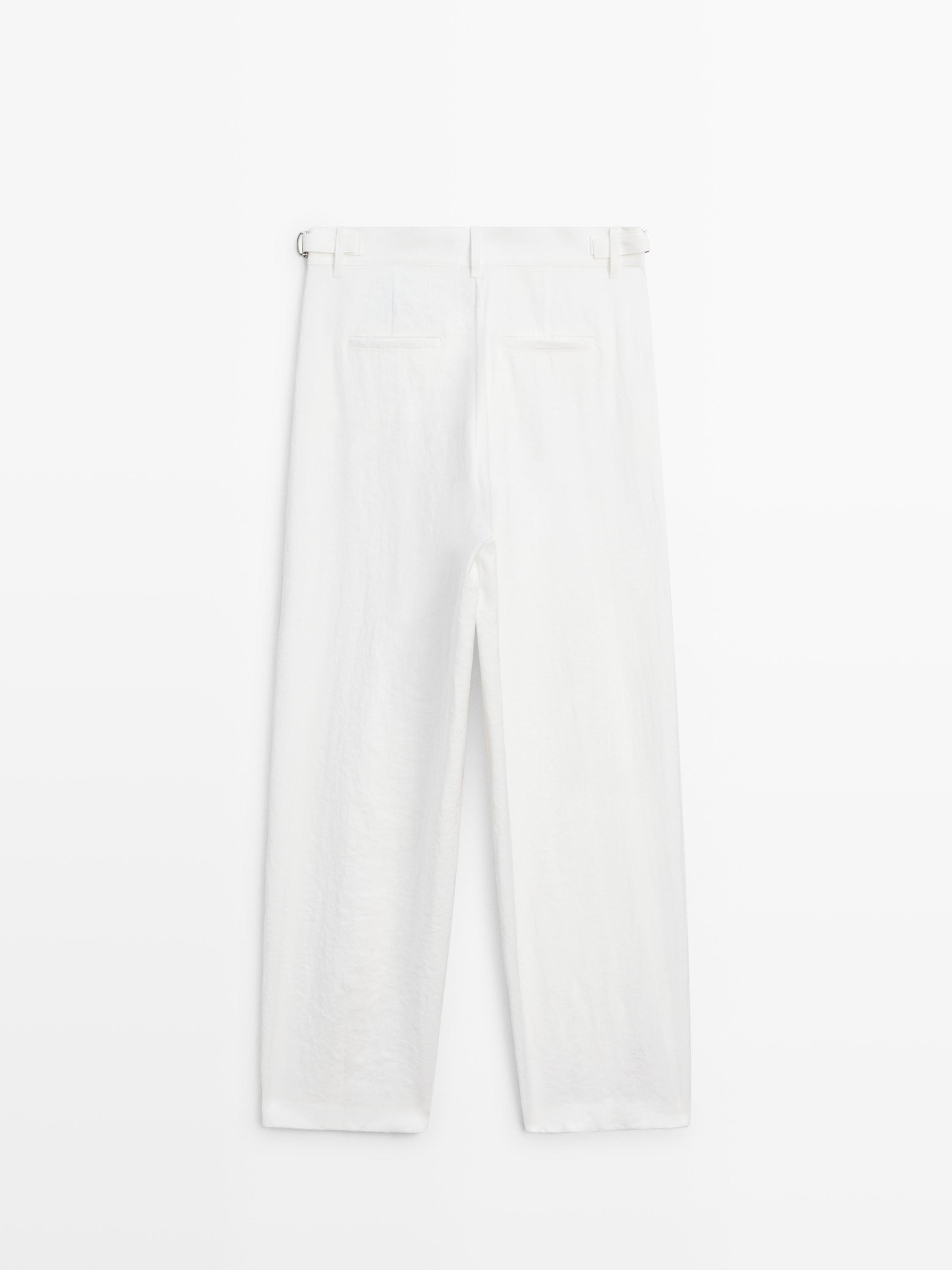 Flowing trousers with buckles