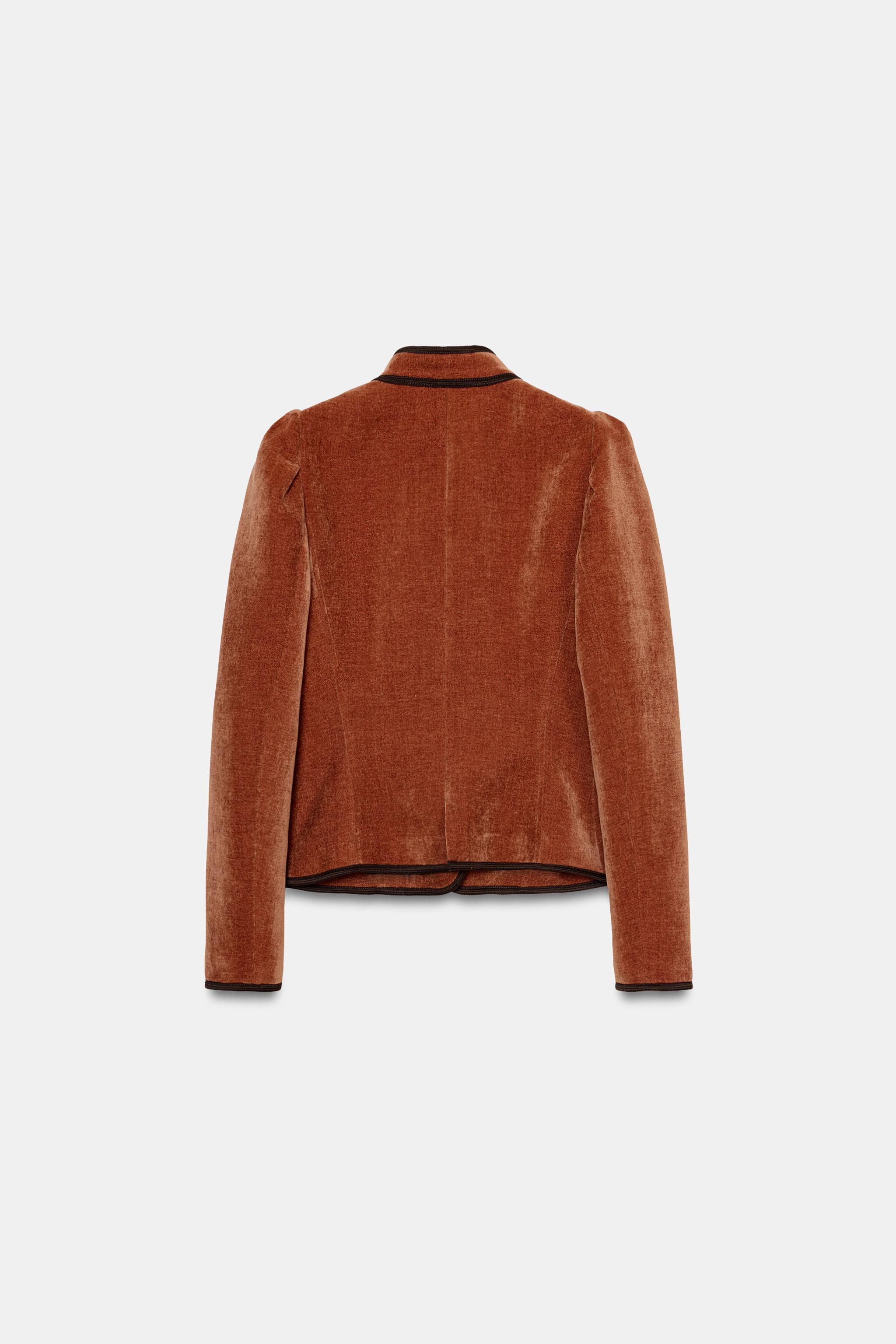 VESTE À LISERÉS EN CONTRASTE