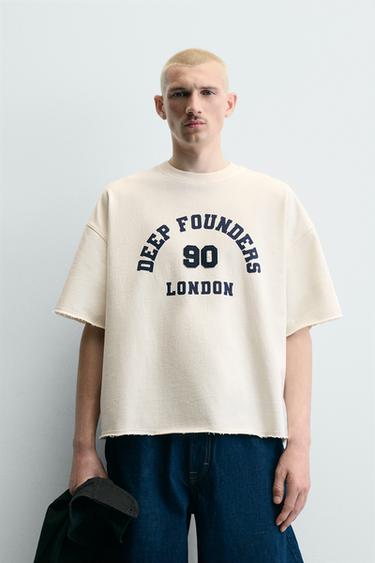 ТОЛСТОВКА BOXY FIT С ПРИНТОМ-НОМЕРОМ — ЖЕЛТОВАТО-БЕЛЫЙ от Zara