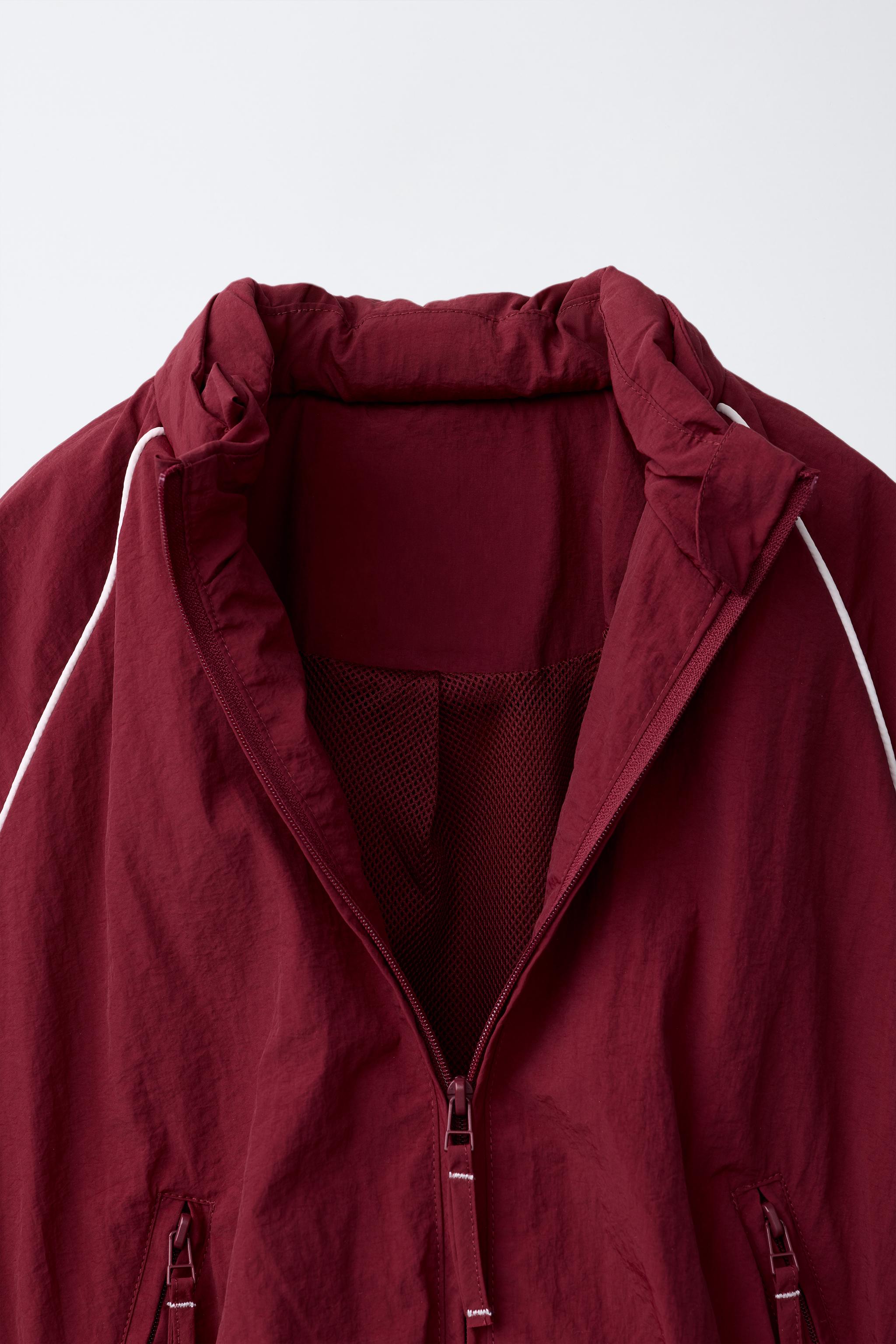 BLOUSON SPORT À LISERÉS CONTRASTANTS