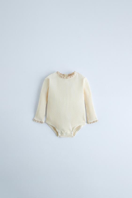 RIBBED BODYSUIT WITH LACE TRIM