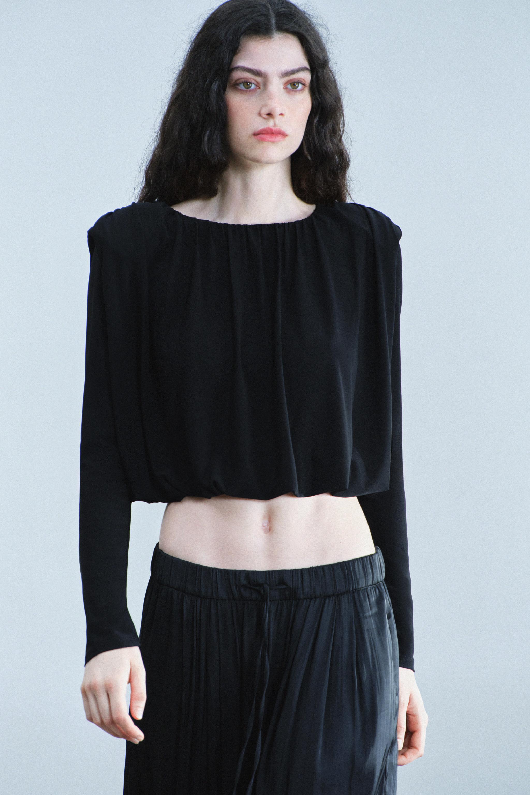 DRAPED SHOULDER-PAD TOP