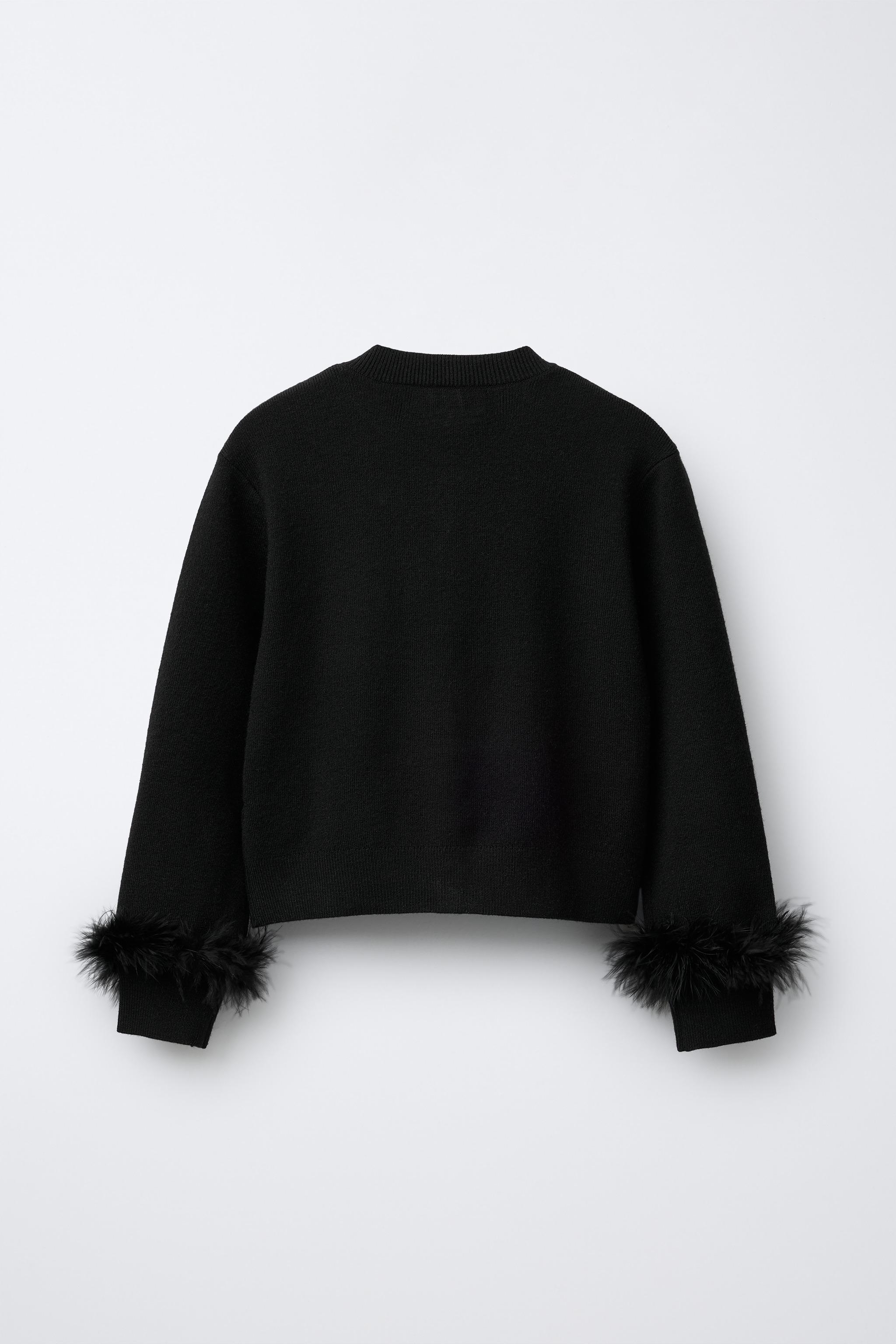 KNIT CARDIGAN WITH DETACHABLE FEATHERS