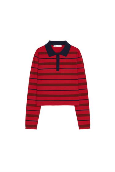 Front view of a red and black striped polo shirt with a navy blue collar and long sleeves.