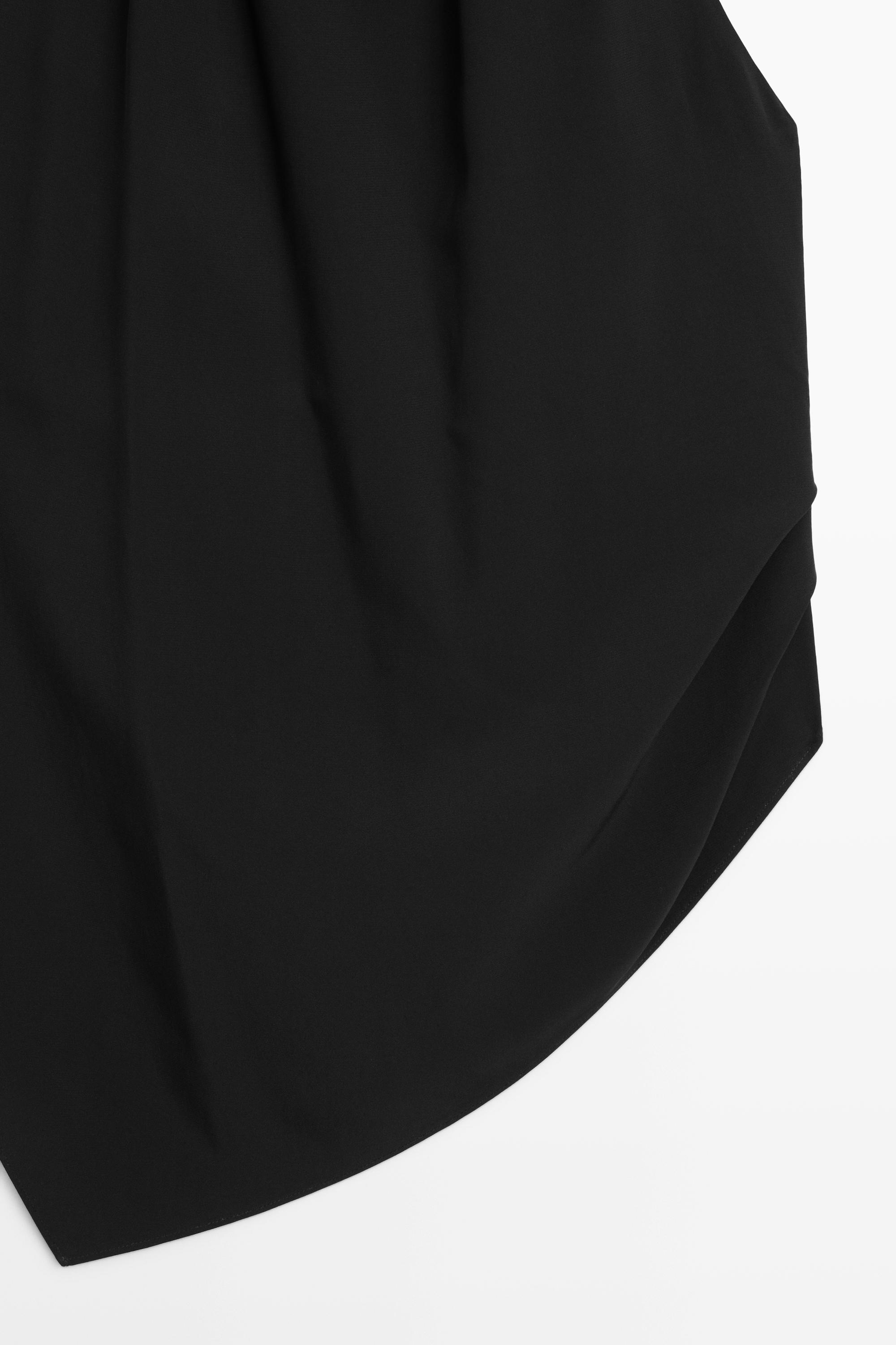 Flowing open-back top