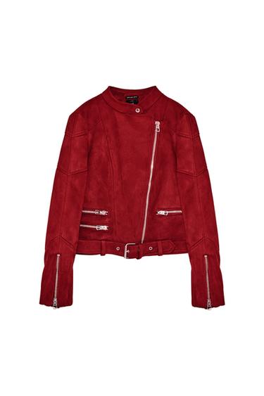 Front view of a red jacket with an asymmetric zip, zip pockets, and a belt at the waist.
