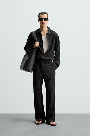 PANTALÓN FLUIDO RAYAS - Negro de Zara - Imagen 0