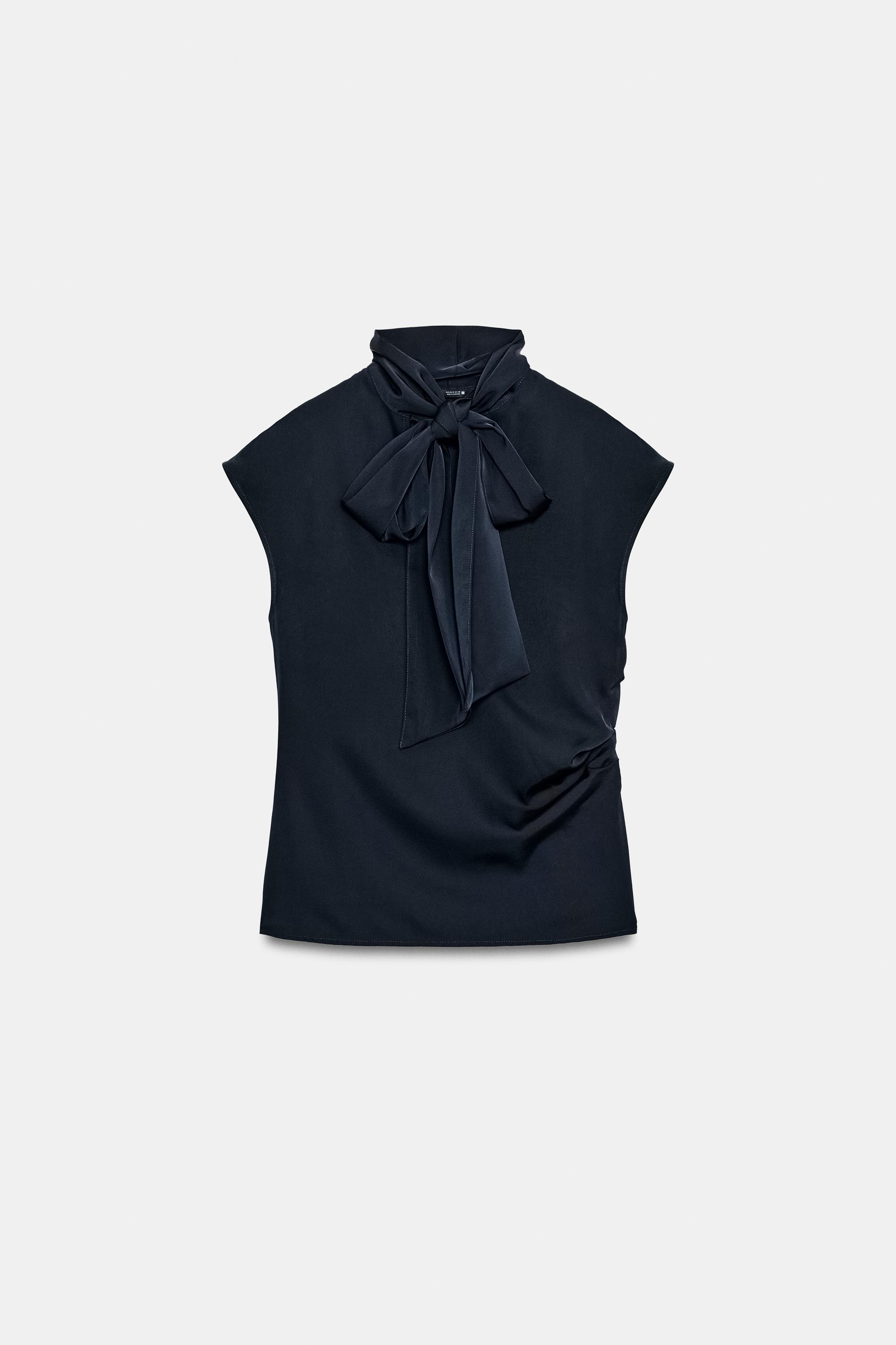 TOP SANS MANCHES AVEC NŒUD