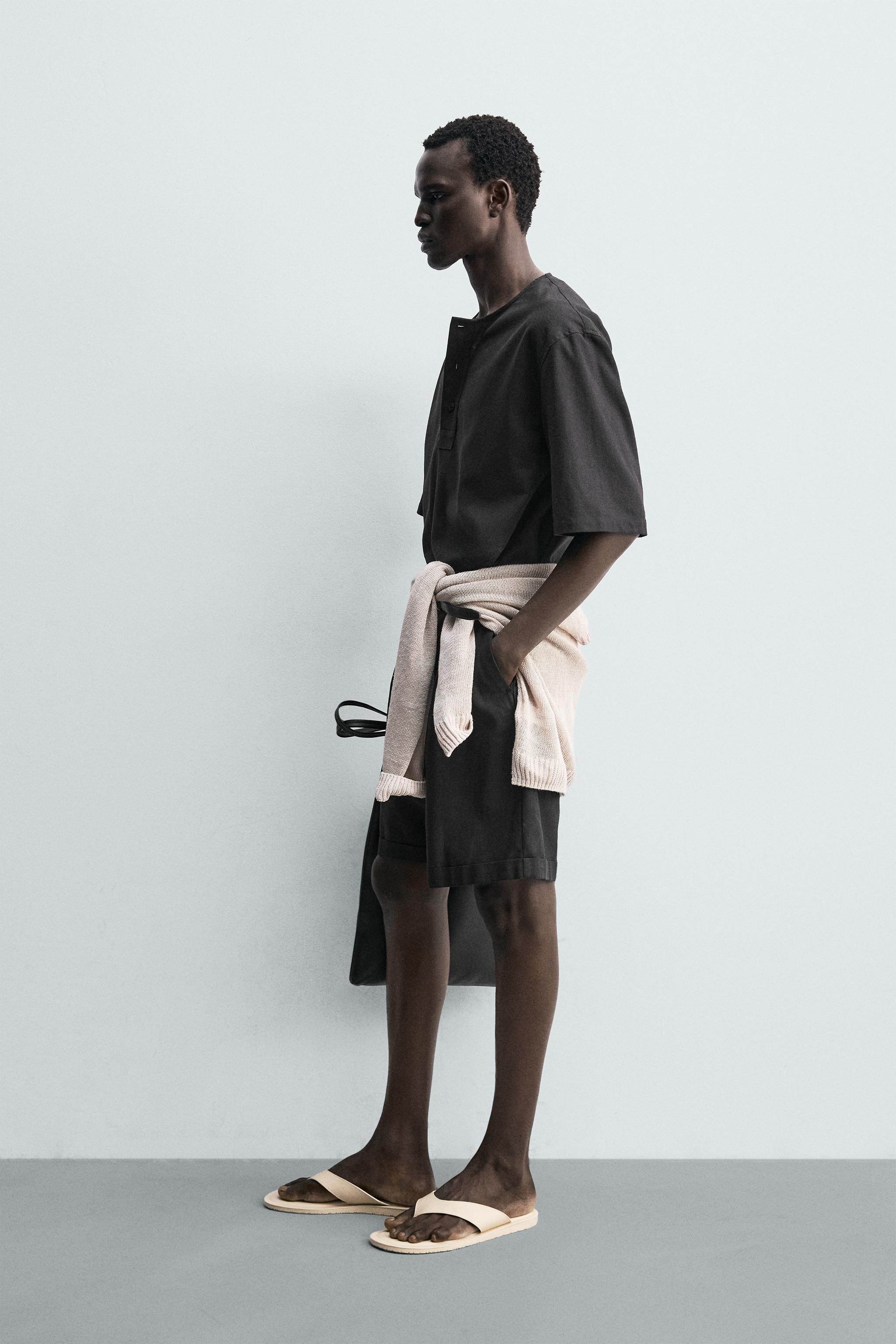 RELAXED FIT PLEATED SHORTS