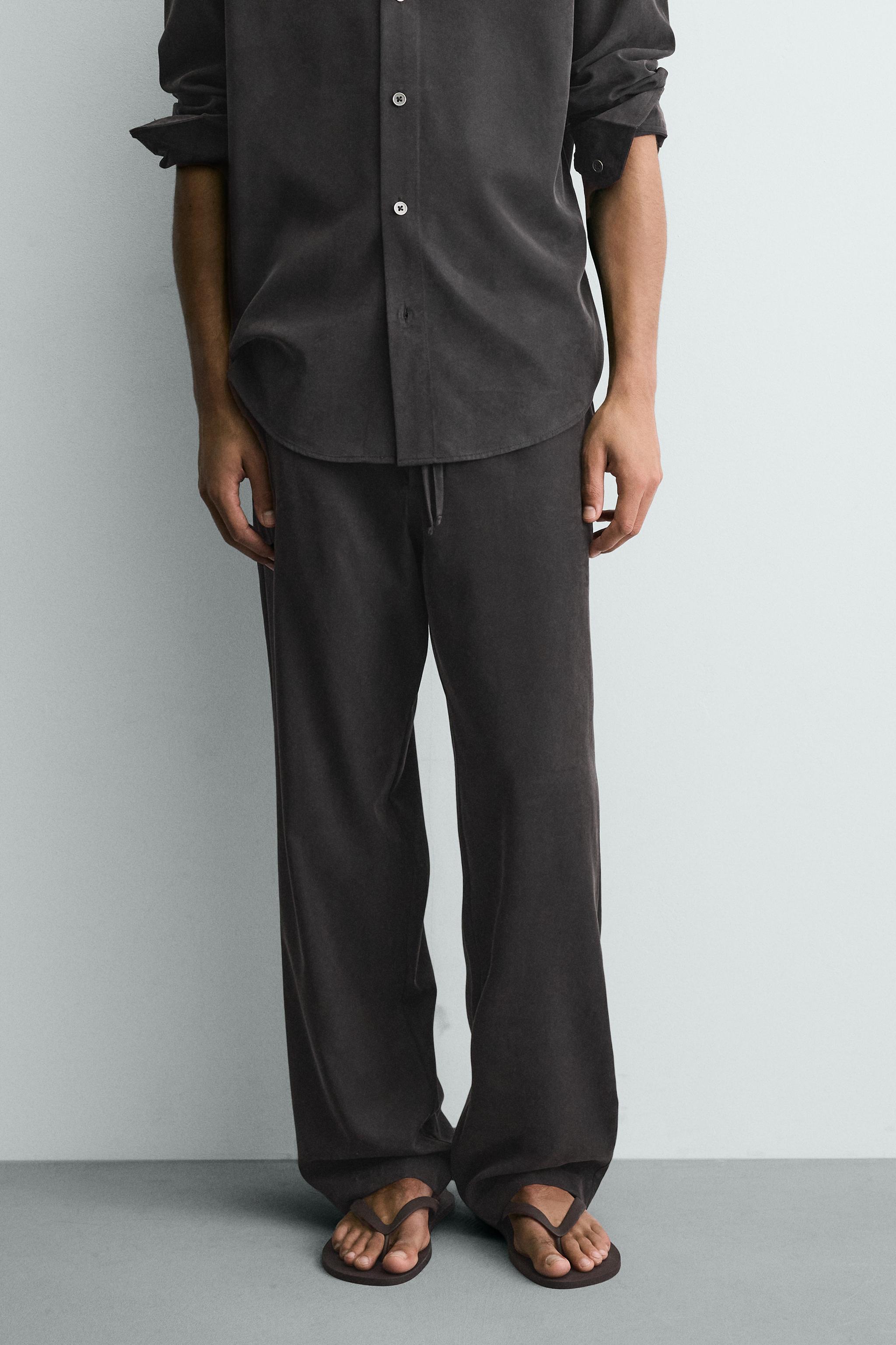 RELAXED FIT FLOWING TROUSERS — Black