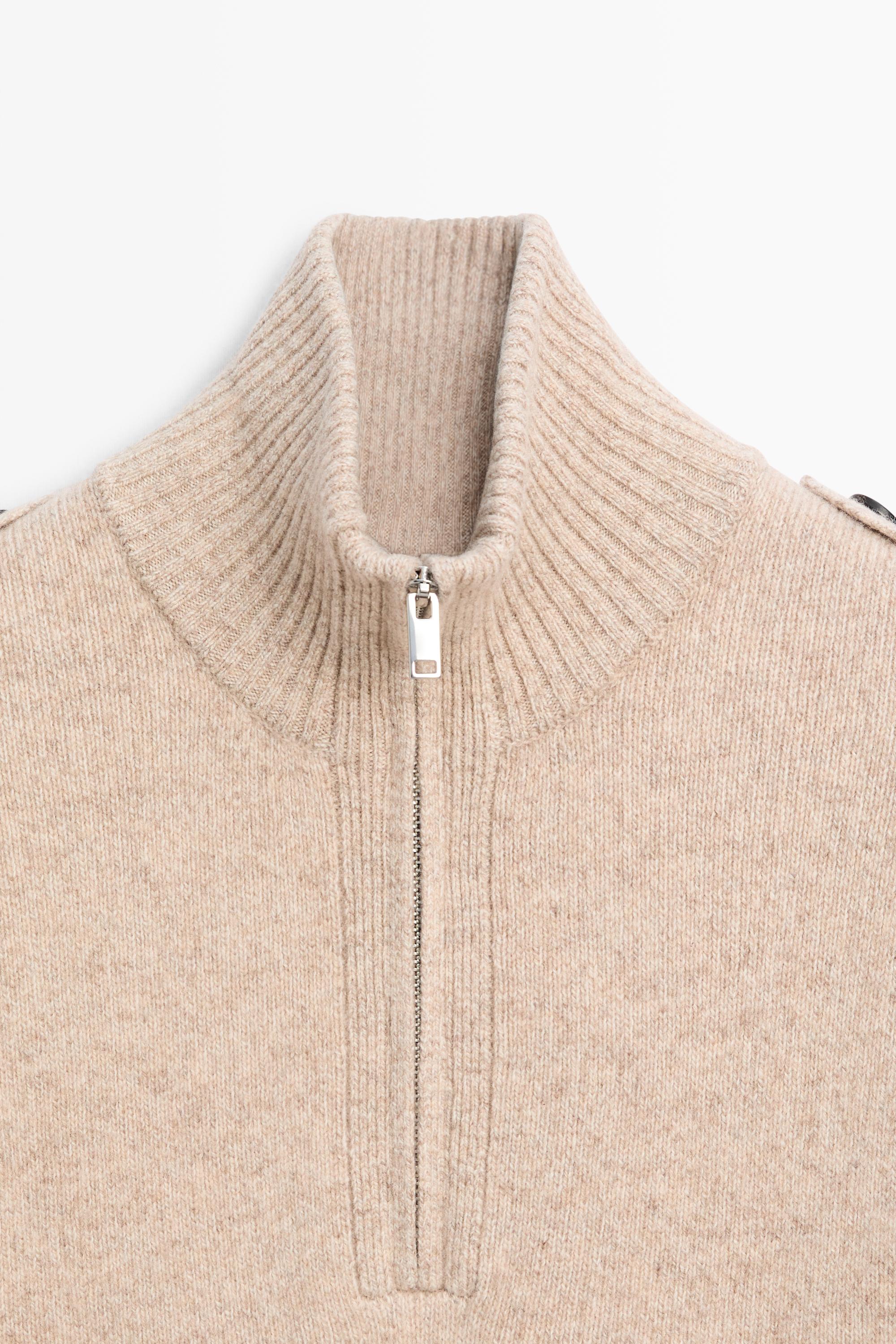 Pull en maille à col montant zippé