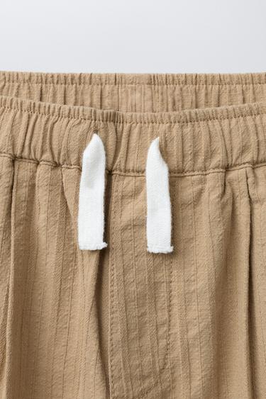 STRAIGHT TEXTURED PLEATED TROUSERS - Ochre by Zara - Image 2