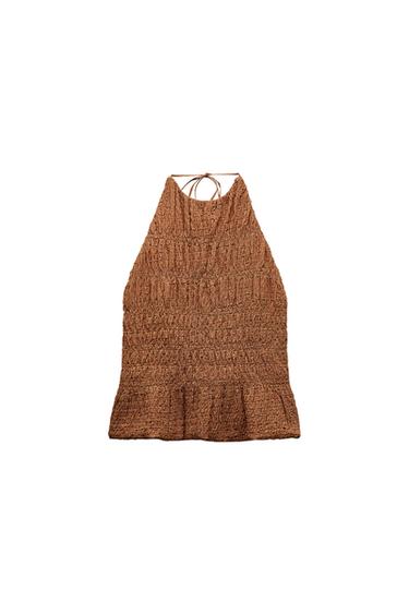 Front view of a brown top with a ruched texture and thin straps.