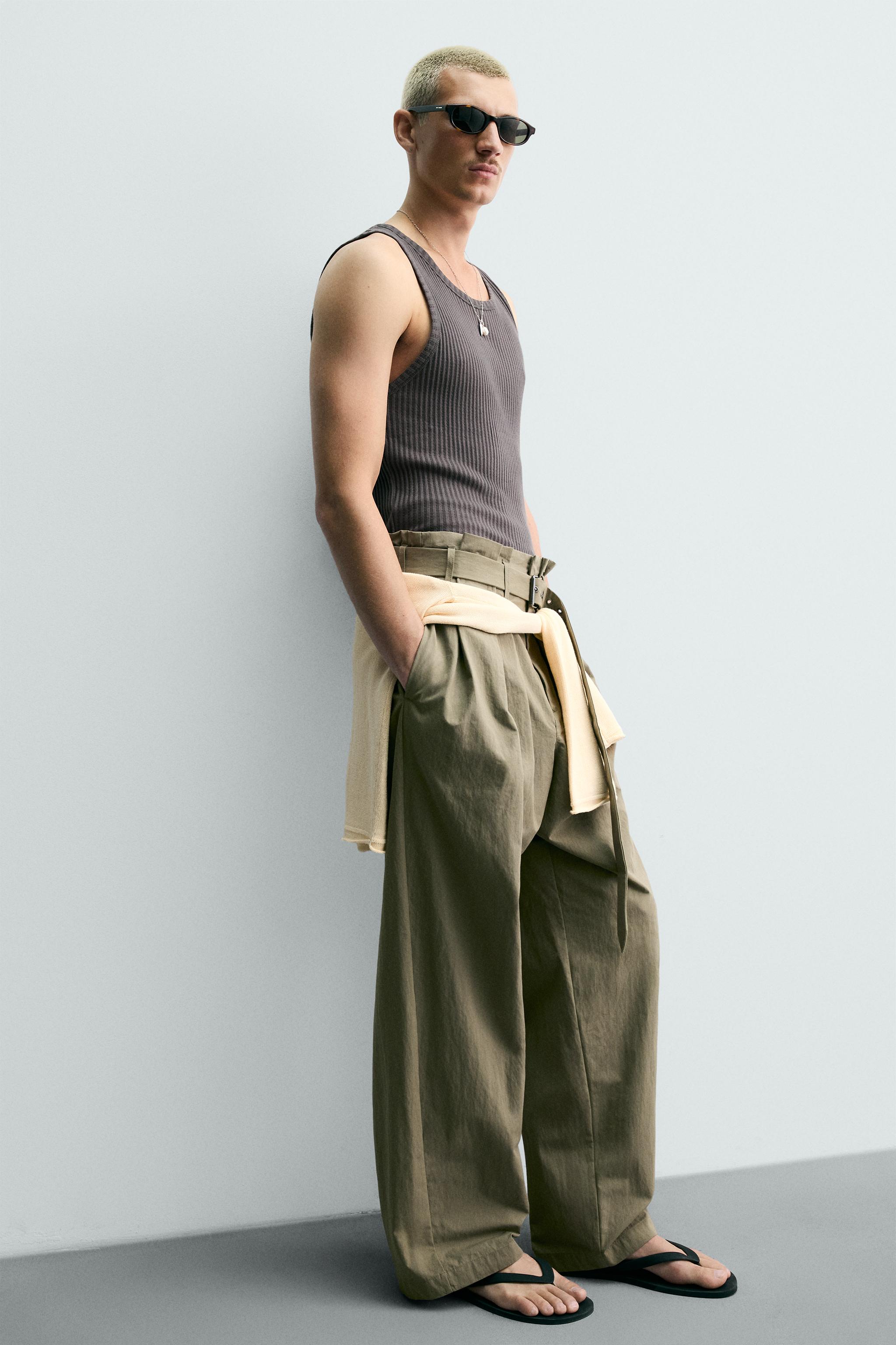 BELTED PLEATED WIDE FIT PANTS