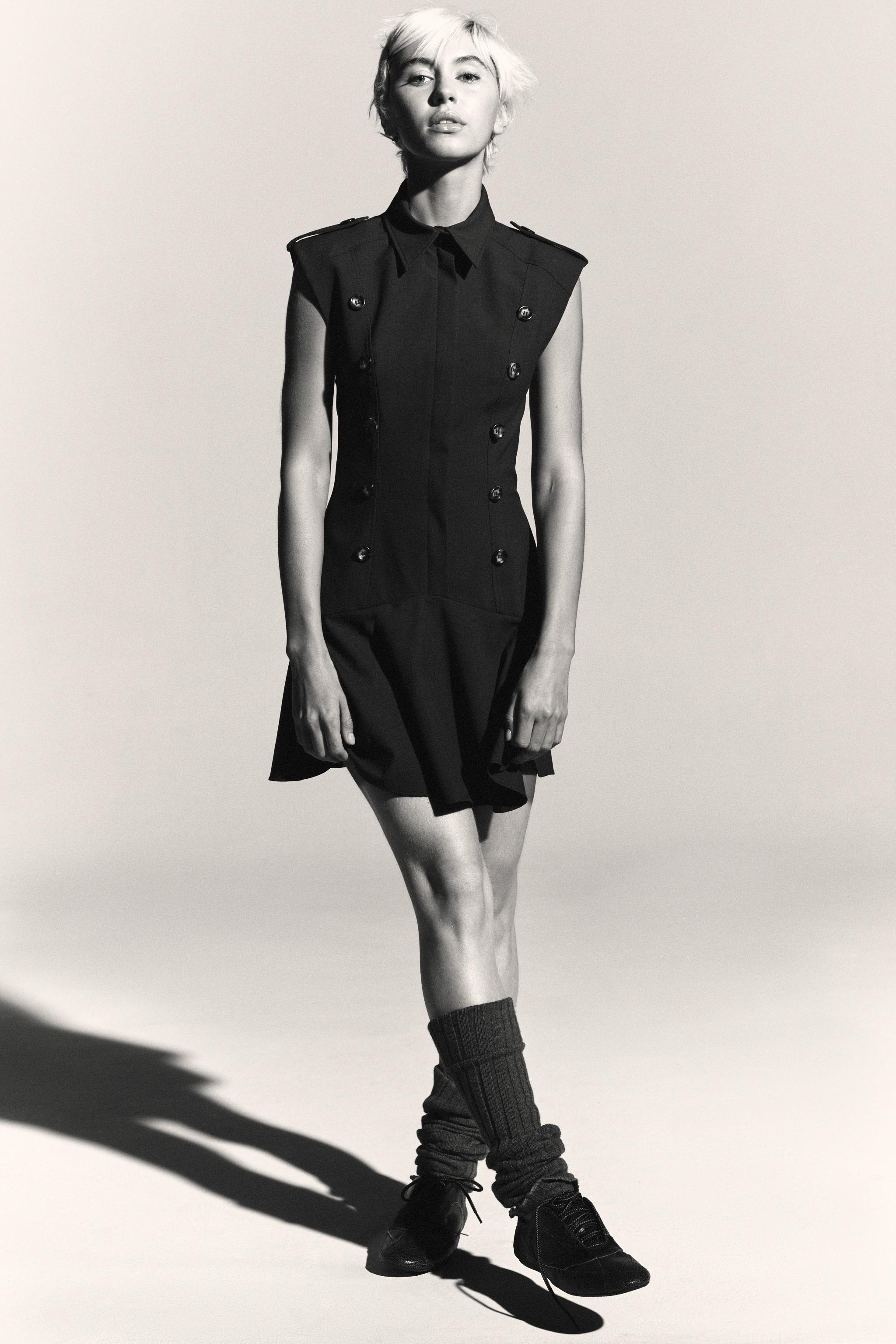 SHORT DRESS WITH SHOULDER PADS AND RUFFLES