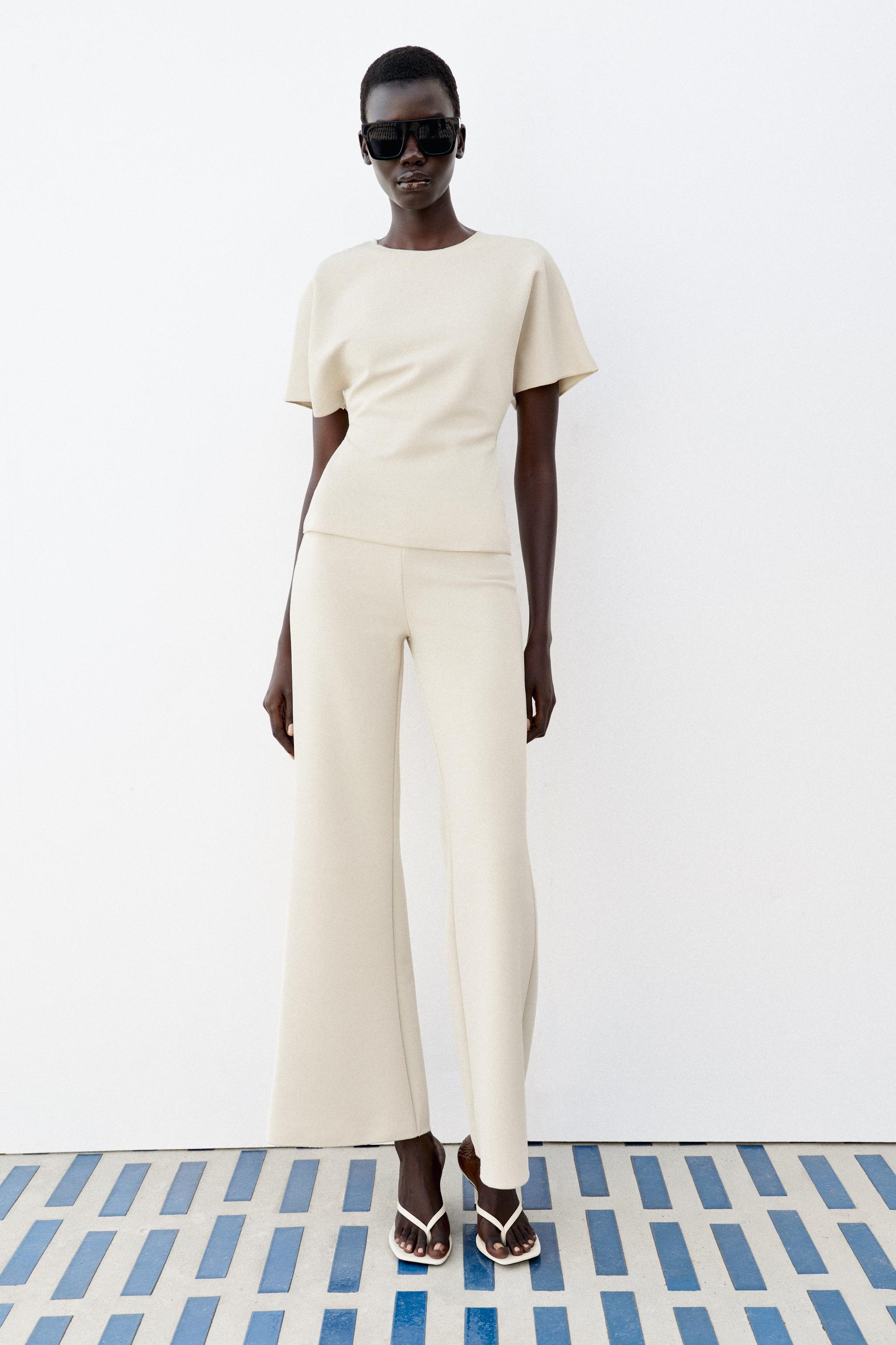 SHORT SLEEVE CUT OUT TOP — Ecru