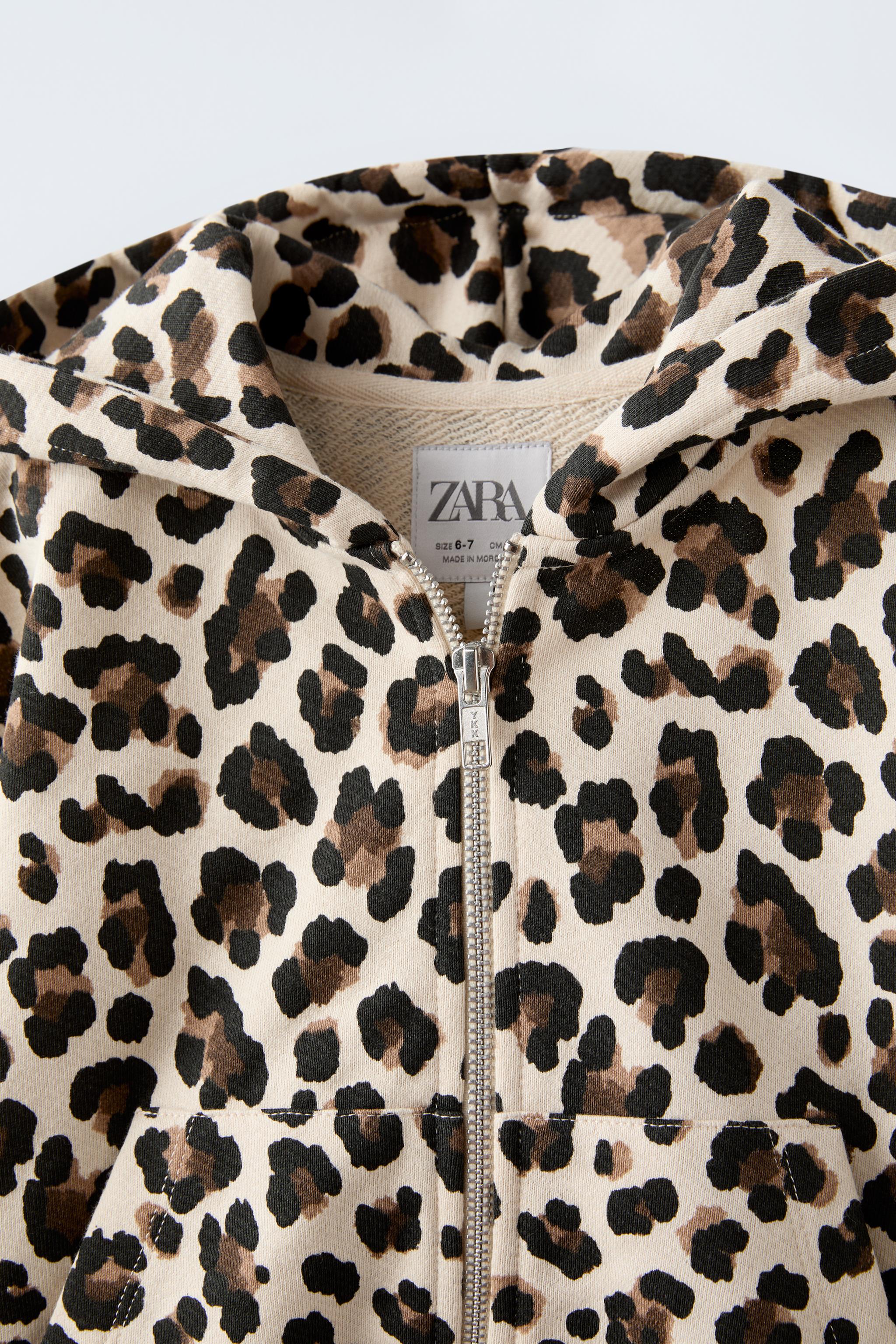 ANIMAL PRINT SWEATSHIRT