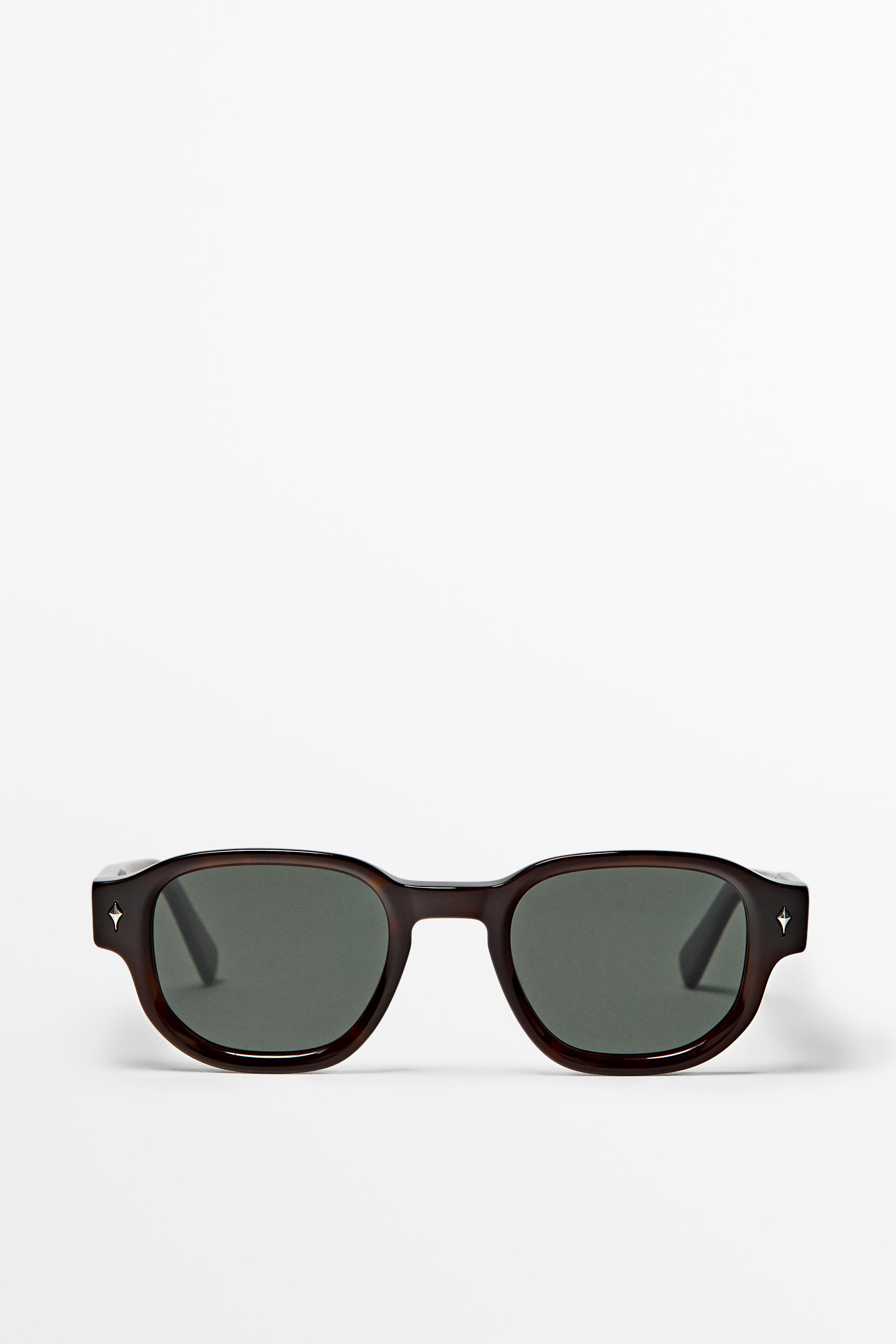 Round sunglasses — Dark brown