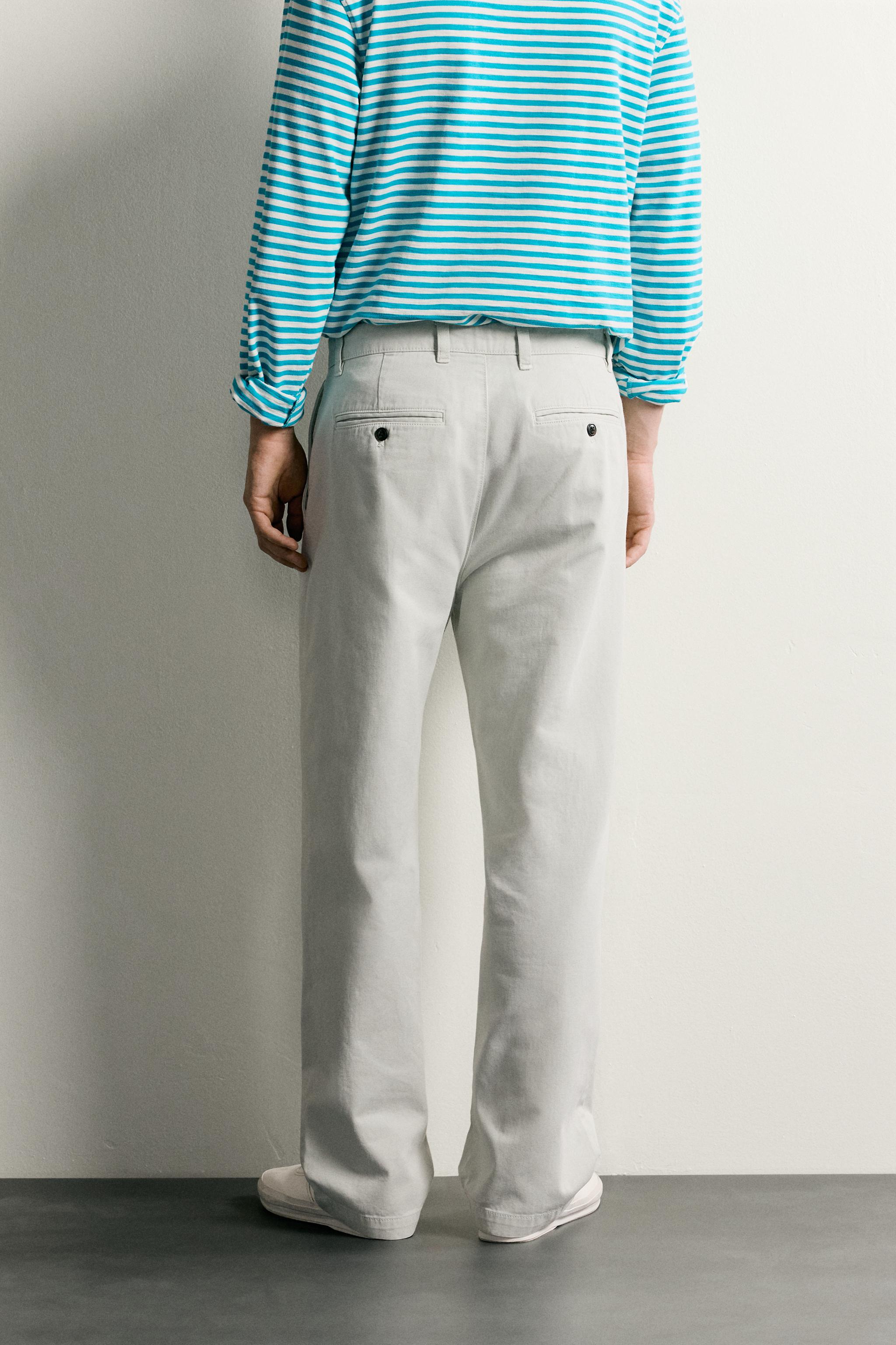 PLEATED STRAIGHT-FIT CHINO TROUSERS