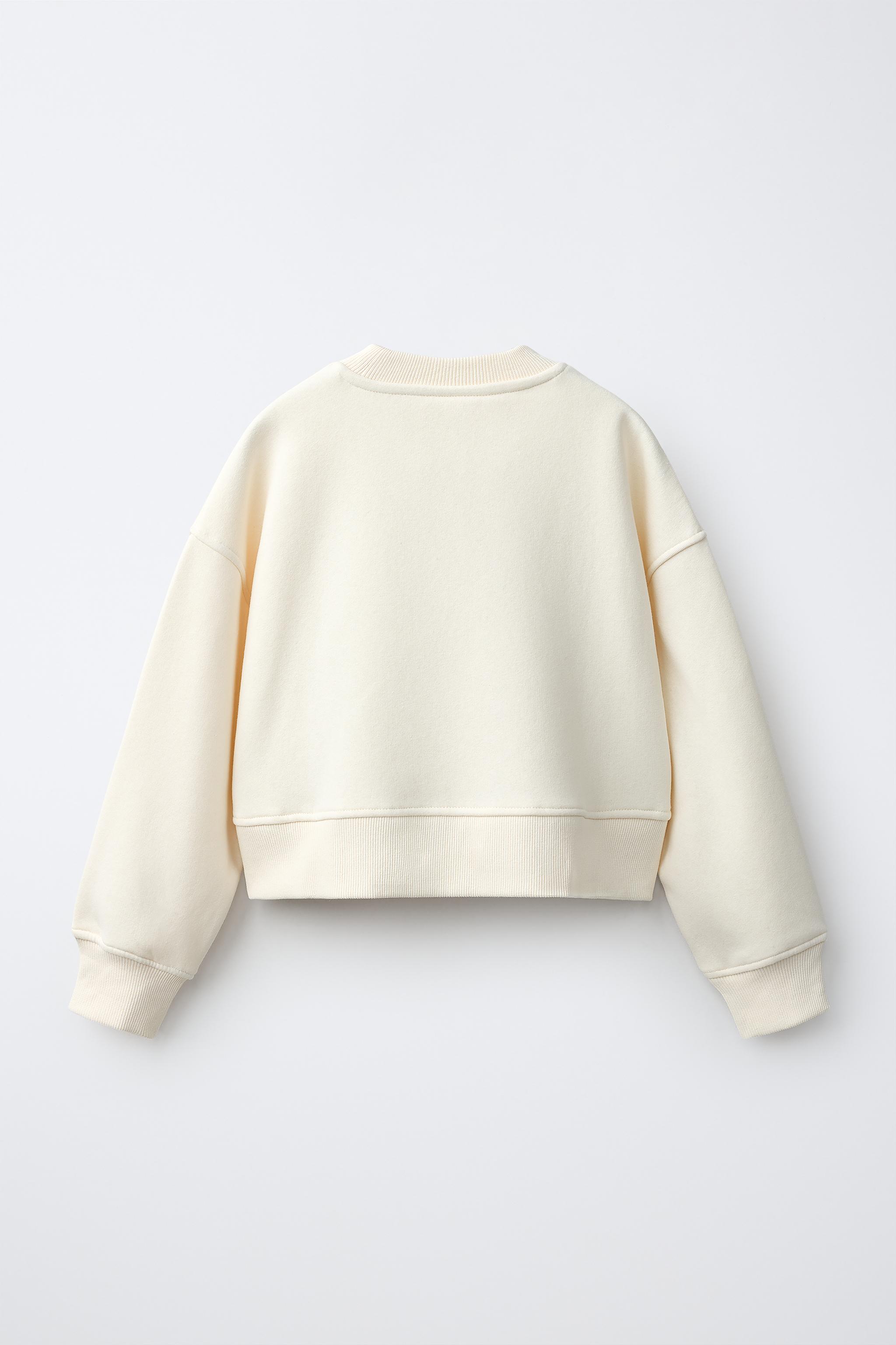 STAR PATCH SWEATSHIRT