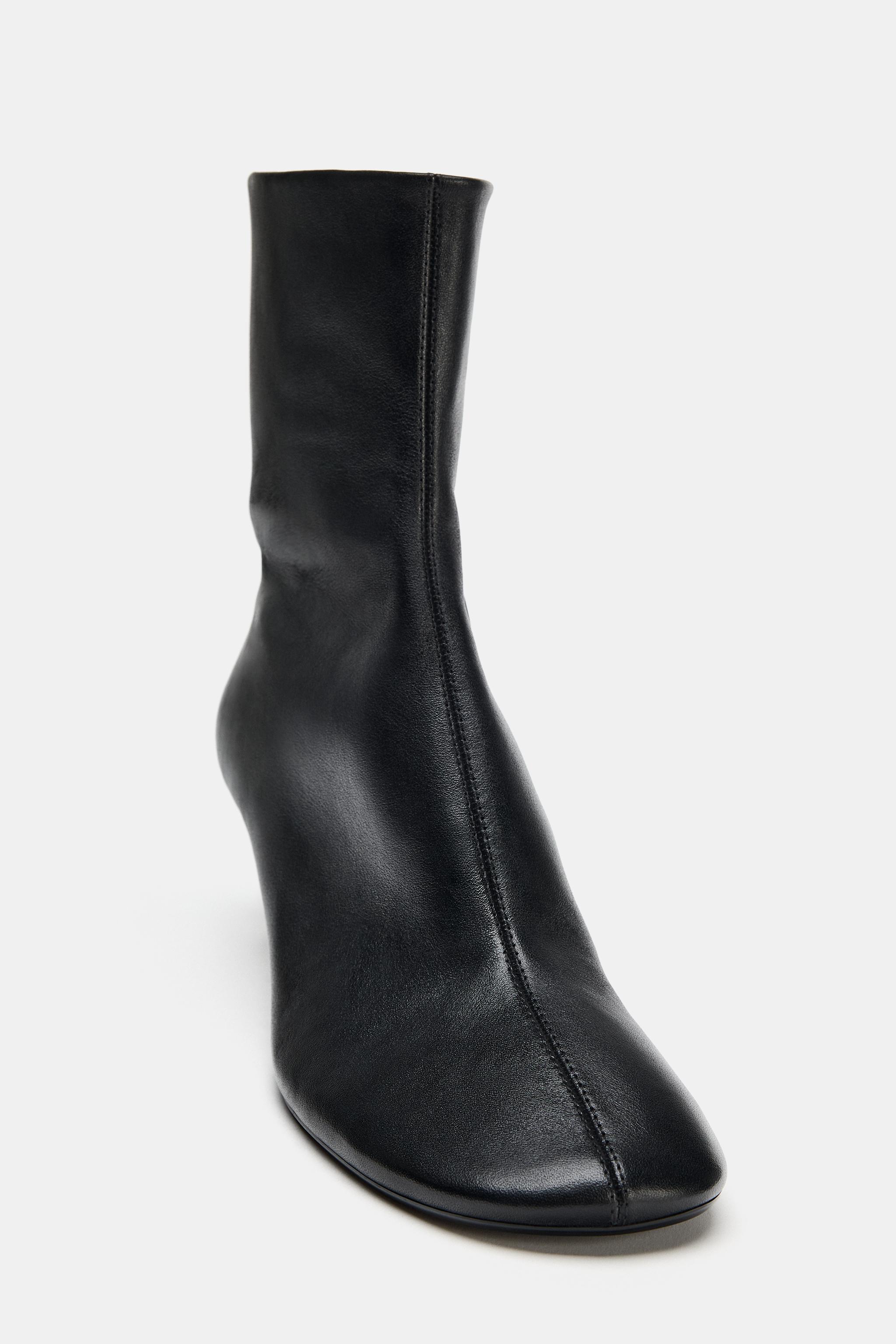 BOTTINES À TALONS EN CUIR