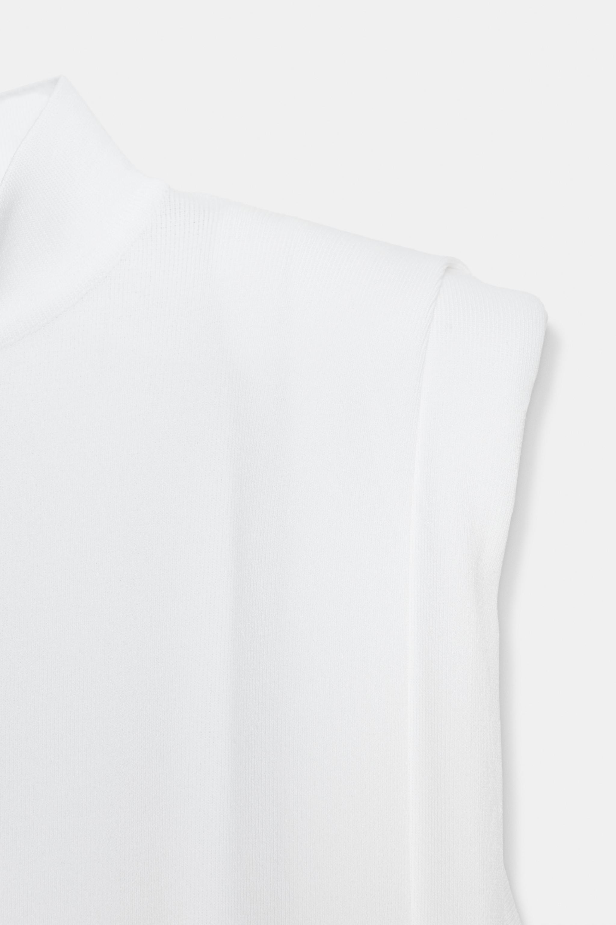 TOP EN MAILLE DOS NU
