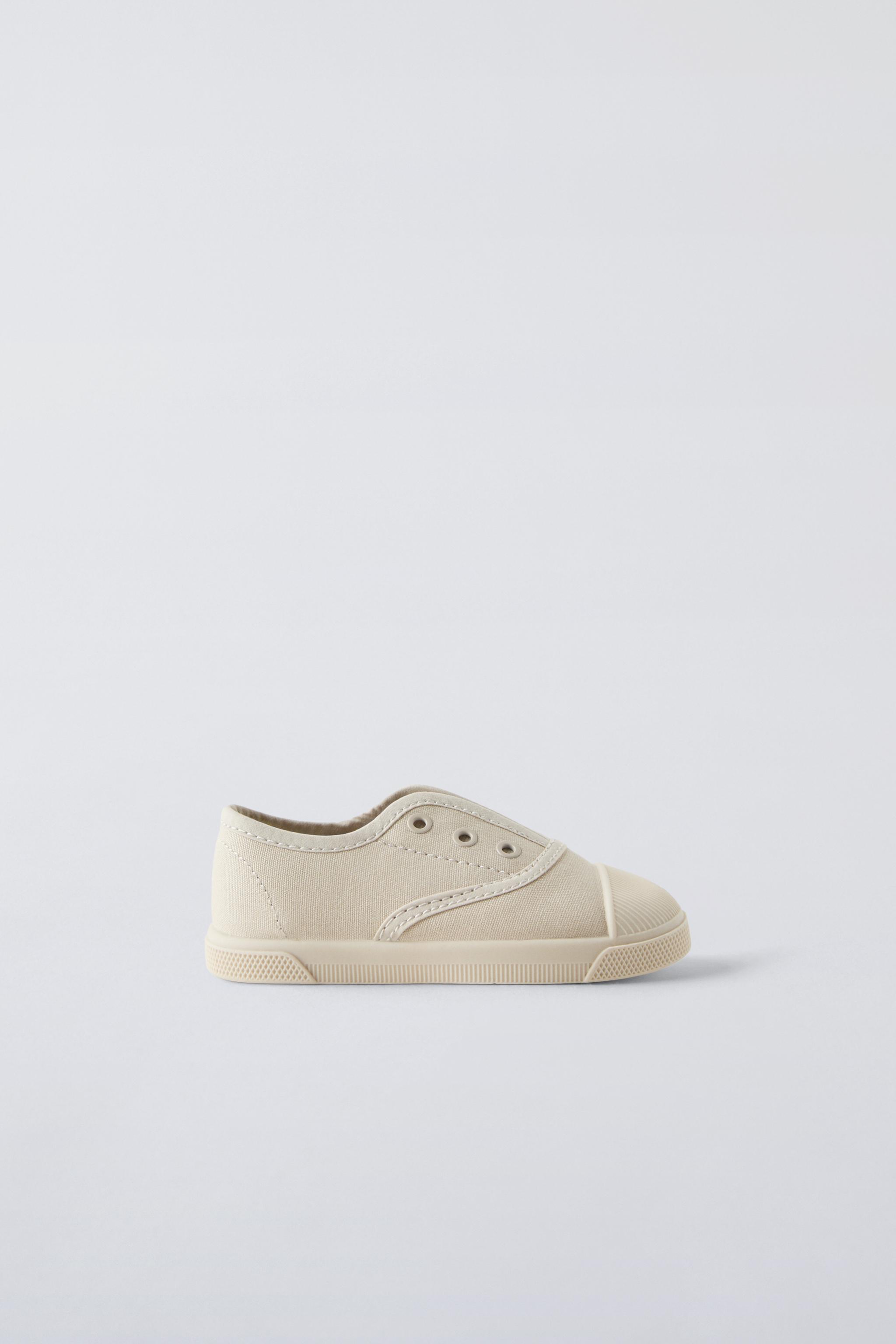 Comme des garçons tenis zara best sale