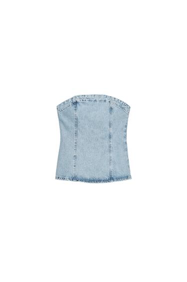 Front view of a light blue bandeau top, straight neckline, visible seams, and a zip back fastening.