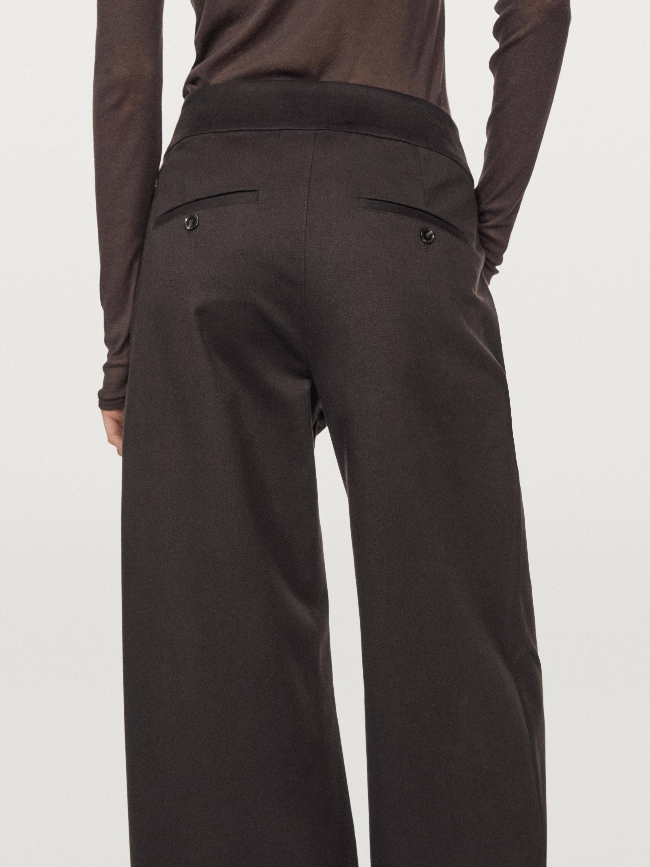 Wide-leg pleated trousers