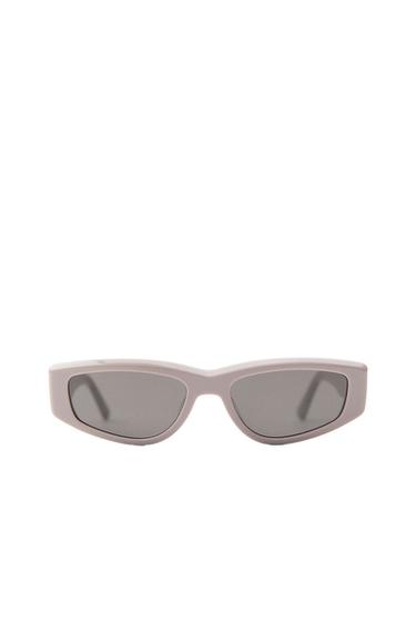 Front view of rectangular sunglasses with grey frames and dark lenses.