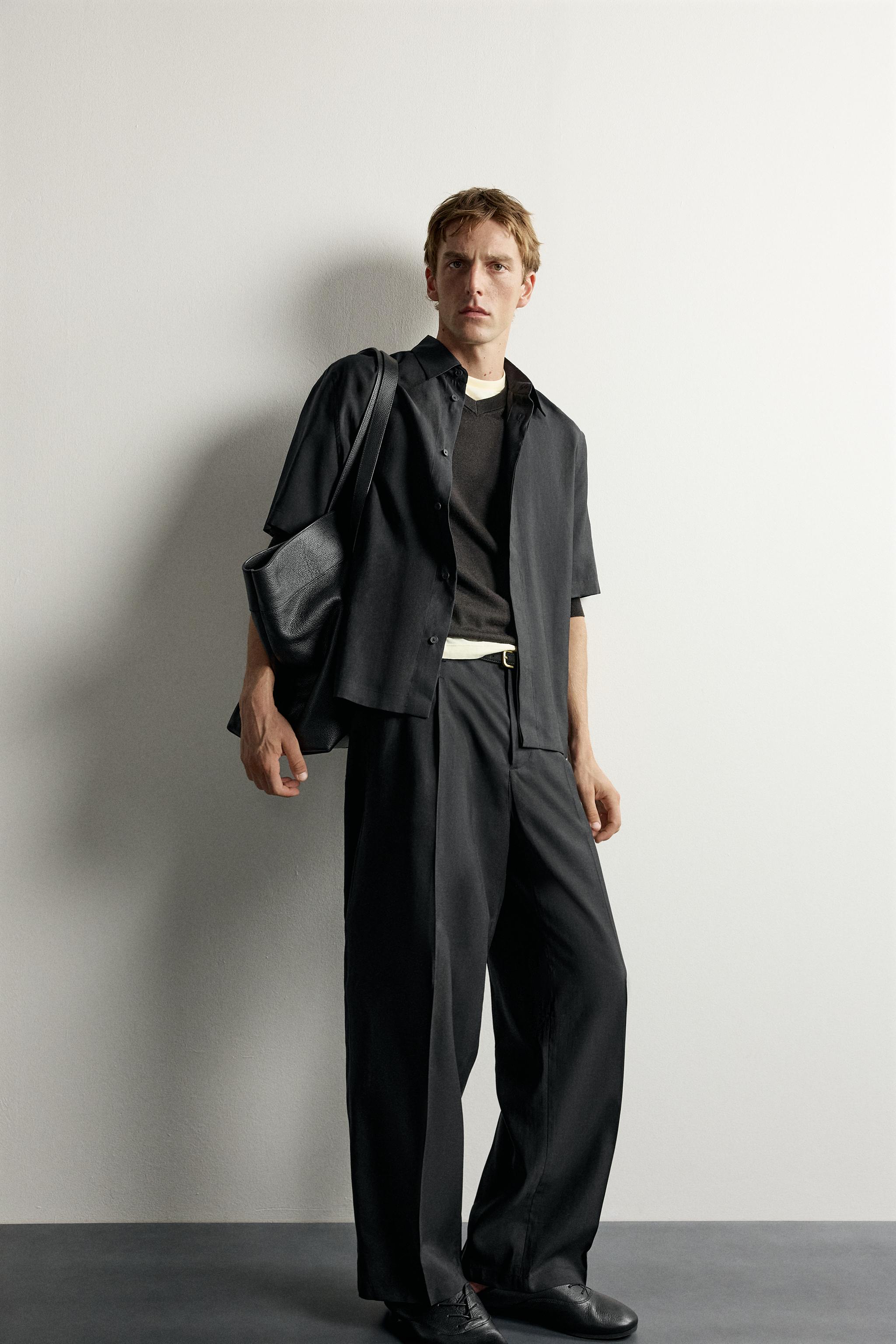 PLEATED FLOWY TROUSERS