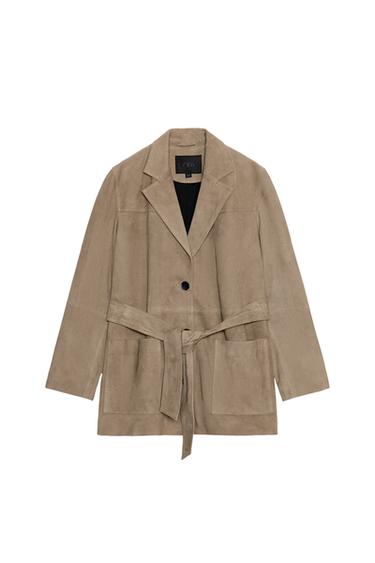 Front view of a stone-coloured jacket with a lapel collar, long sleeves, patch front pockets, button and belt.