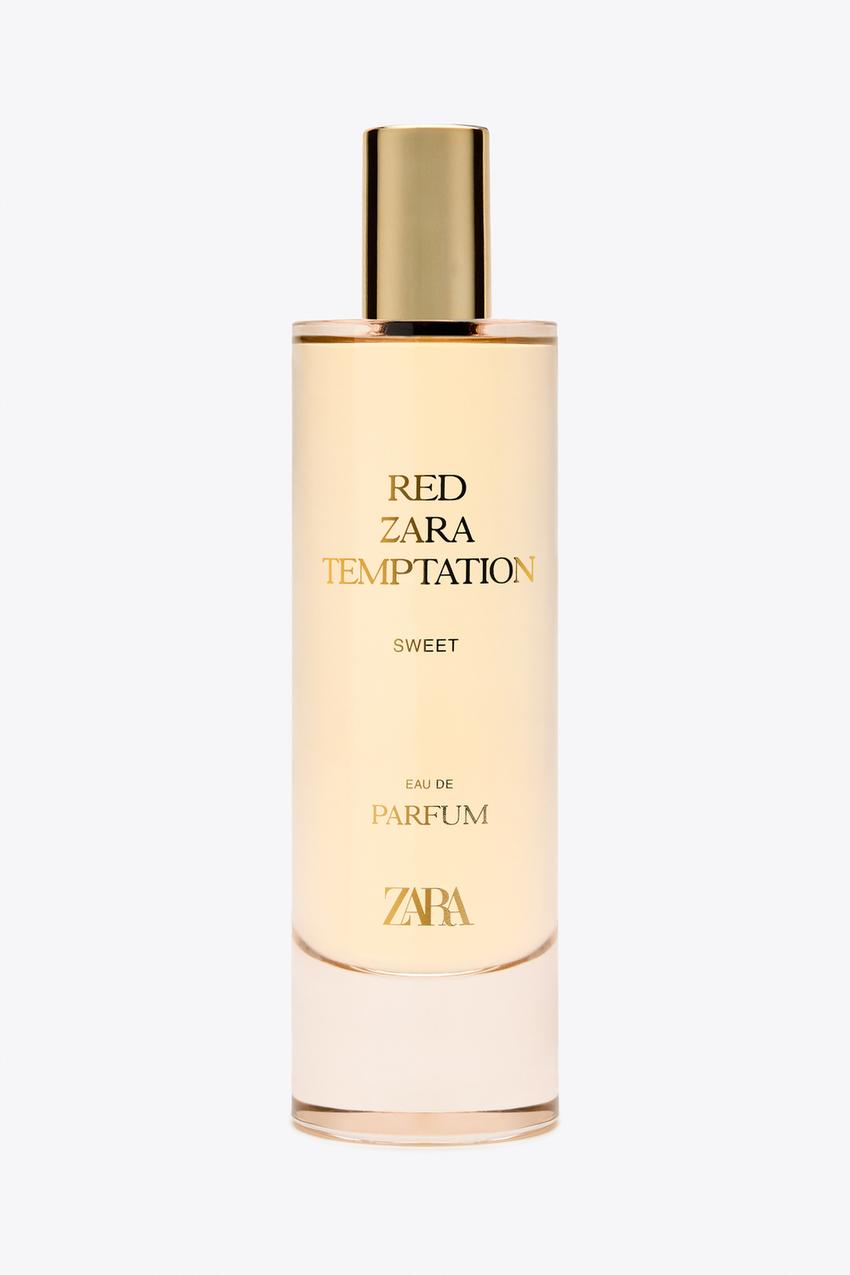Perfume bottle with visible text "RED ZARA TEMPTATION SWEET EAU DE PARFUM ZARA", cylindrical design and gold lid.