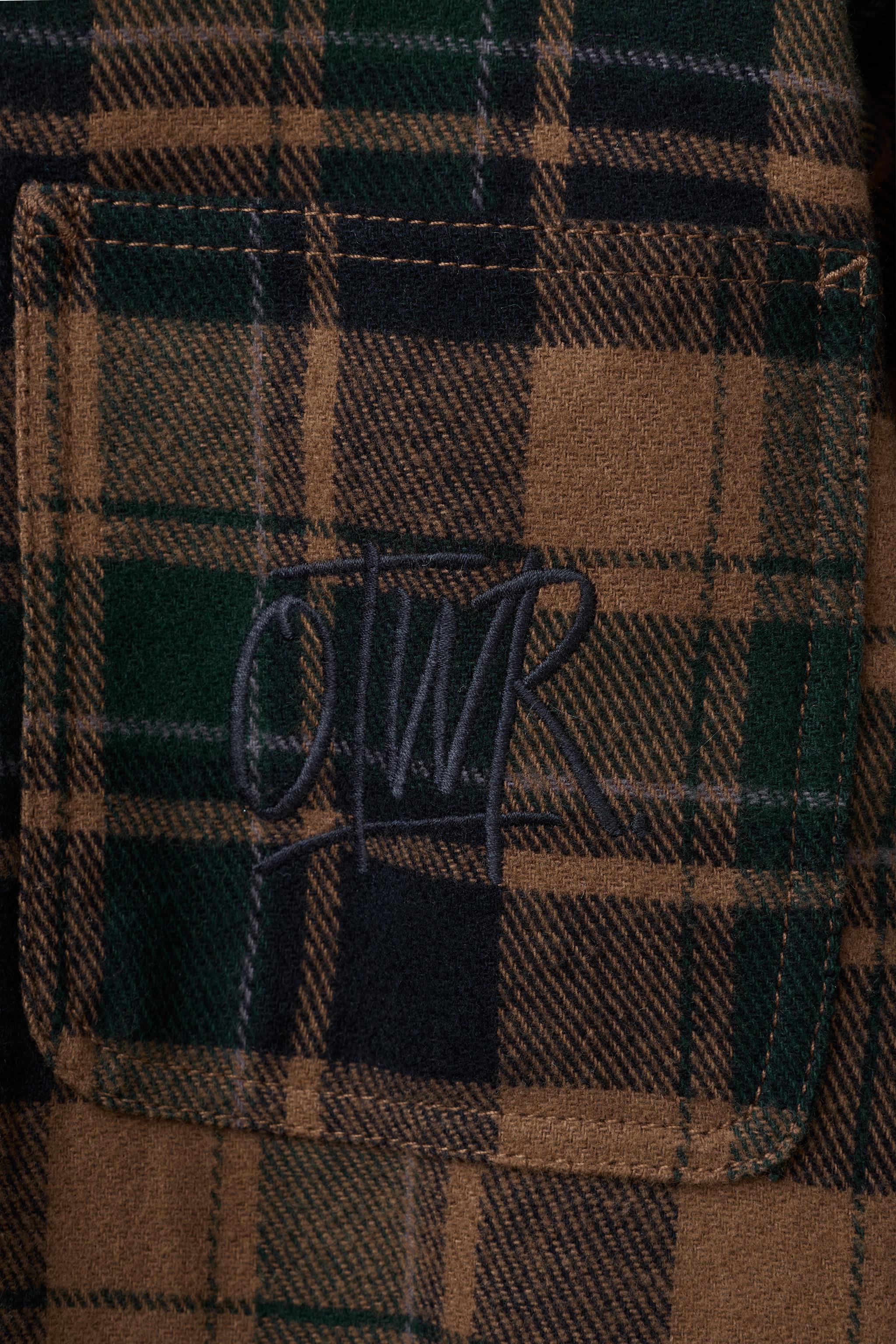 SURCHEMISE À CARREAUX EFFET MOUTON CAPUCHE AMOVIBLE