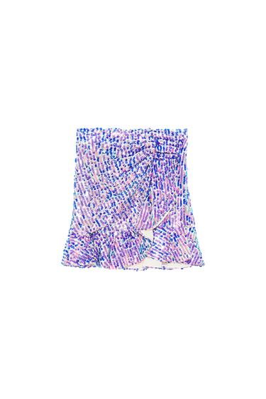 MINI SKIRT WITH SEQUINS AND RUFFLES