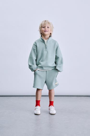 ТОЛСТОВКА ИЗ ИНТЕРЛОКА С НАШИВКОЙ — ГОЛУБОЙ от Zara