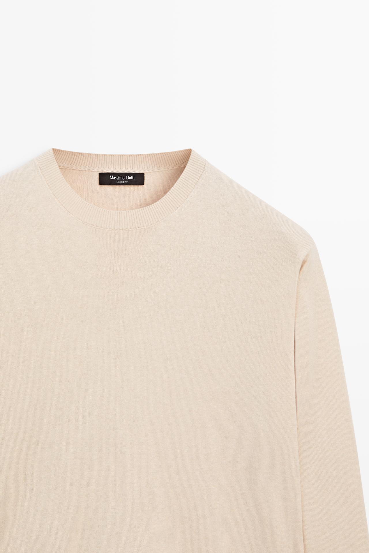 Cotton blend knit sweater — 153