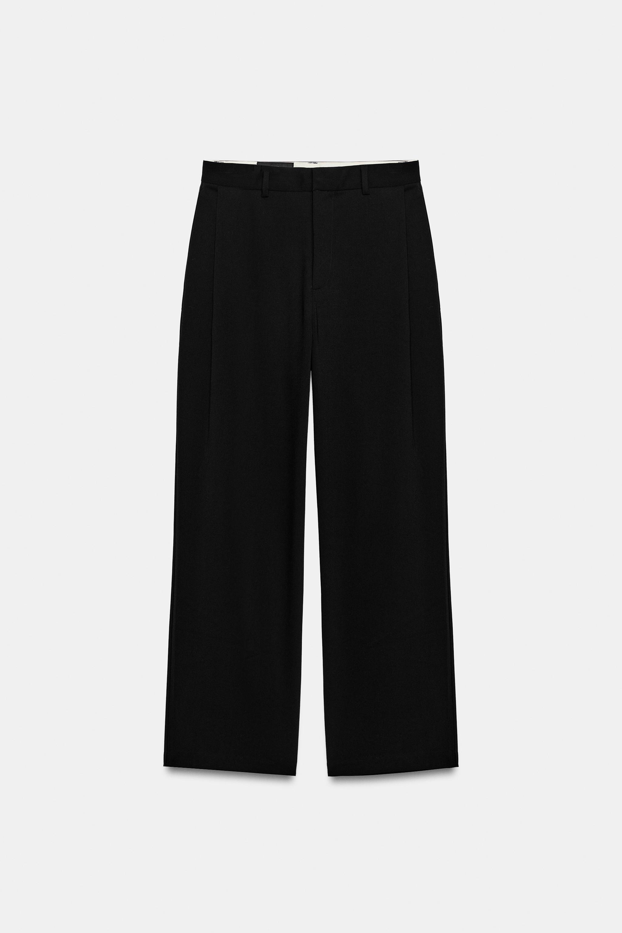 STRIPED PLEATED PANTS