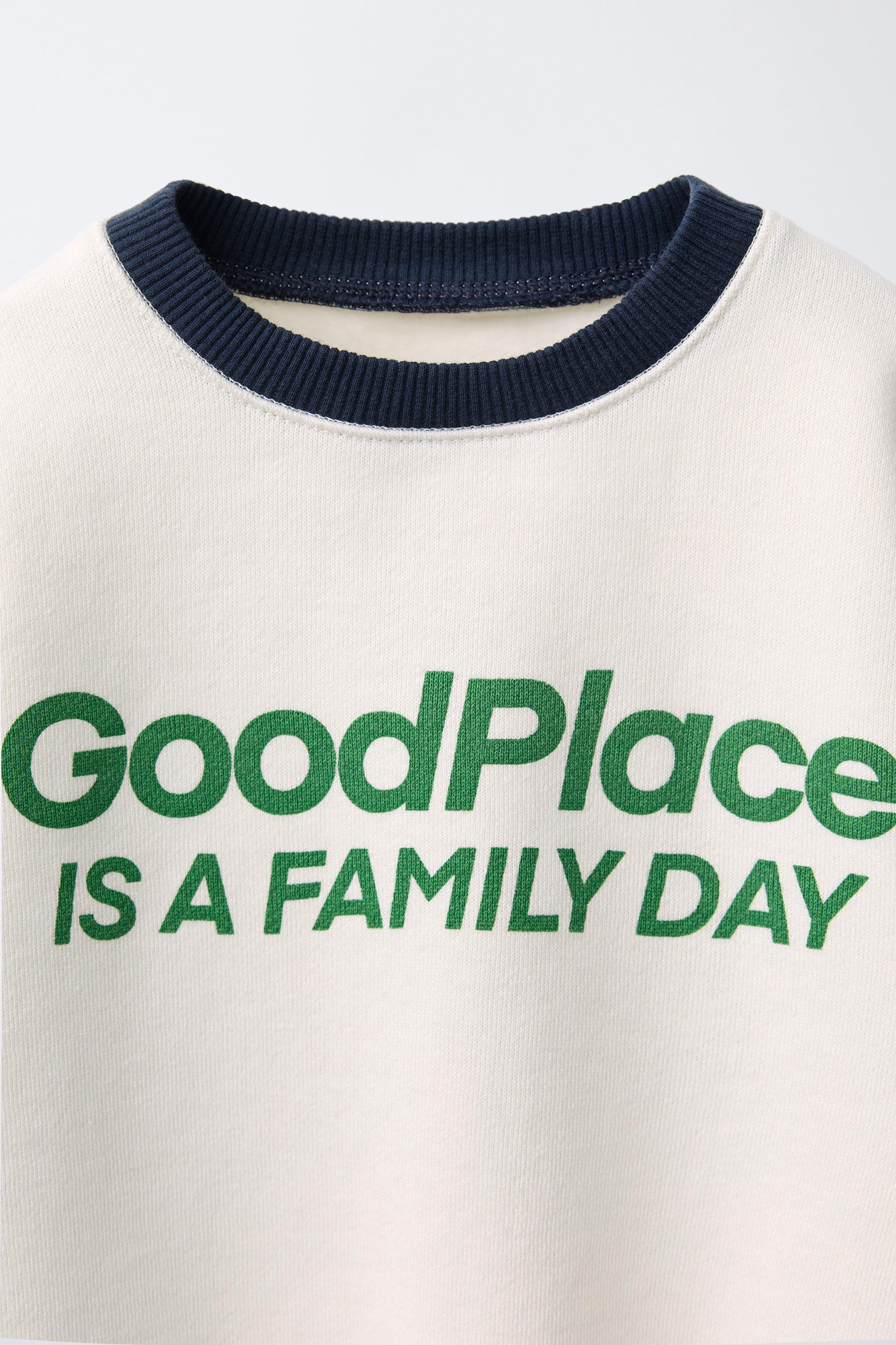 TEXT RAGLAN SLEEVE SWEATSHIRT