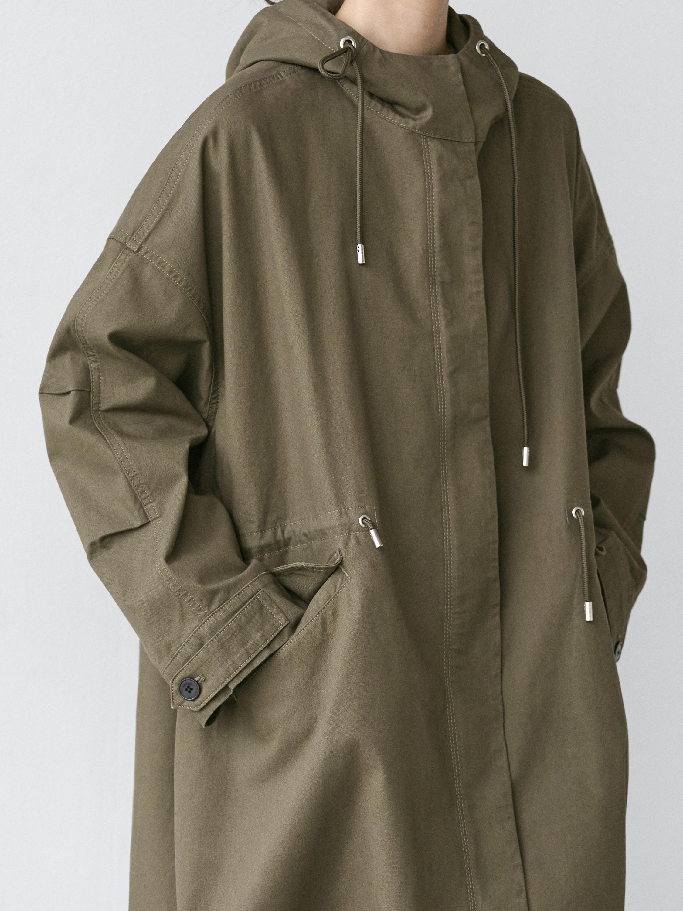 Trench tissu technique à capuche